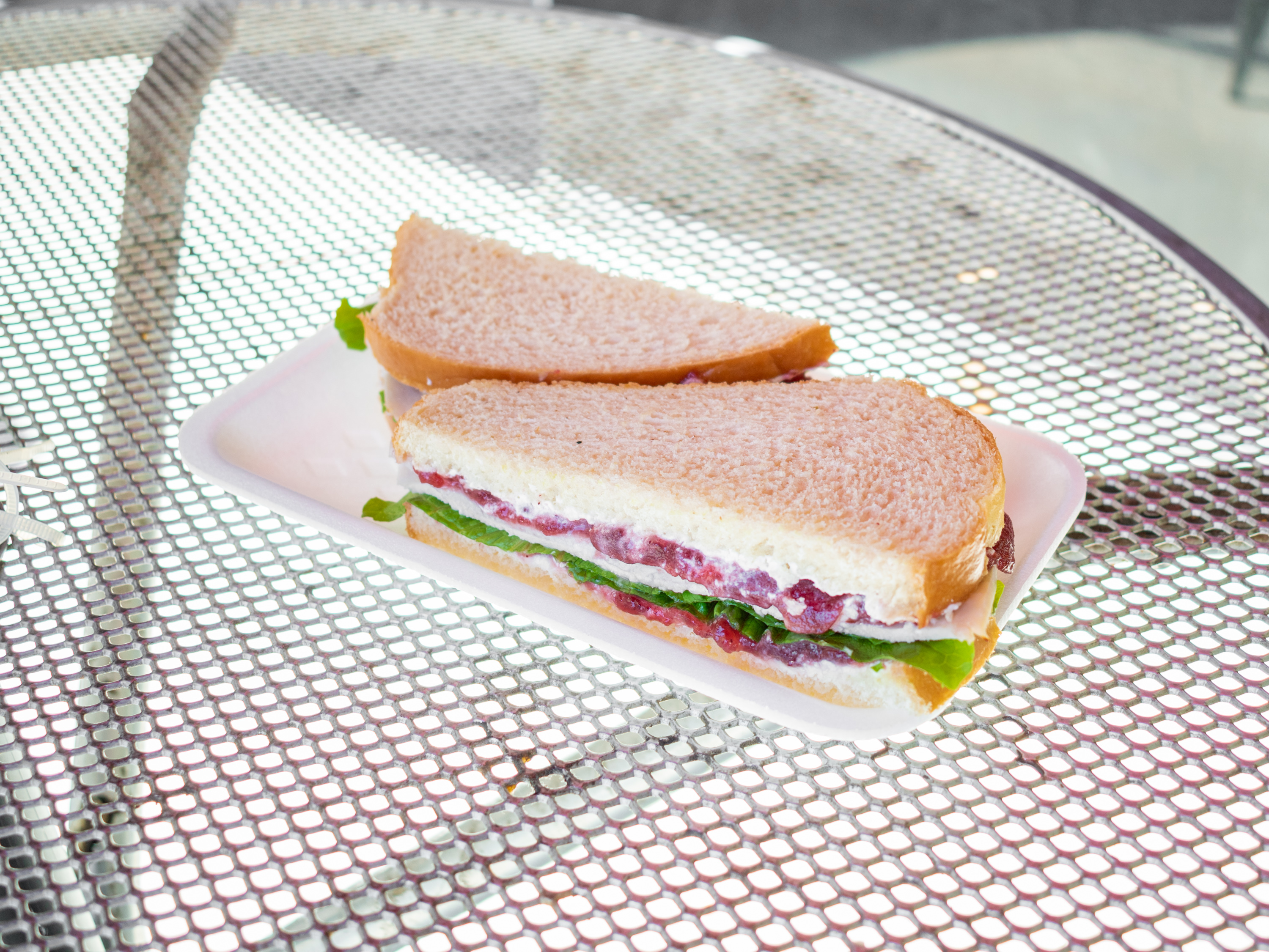 Order Turkey Cranberry Sandwich food online from Chateau Gourmet store, Palm Desert on bringmethat.com