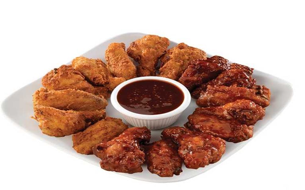 Order Boneless Wings - 1/2 lb. food online from Happy's Pizza store, Detroit on bringmethat.com