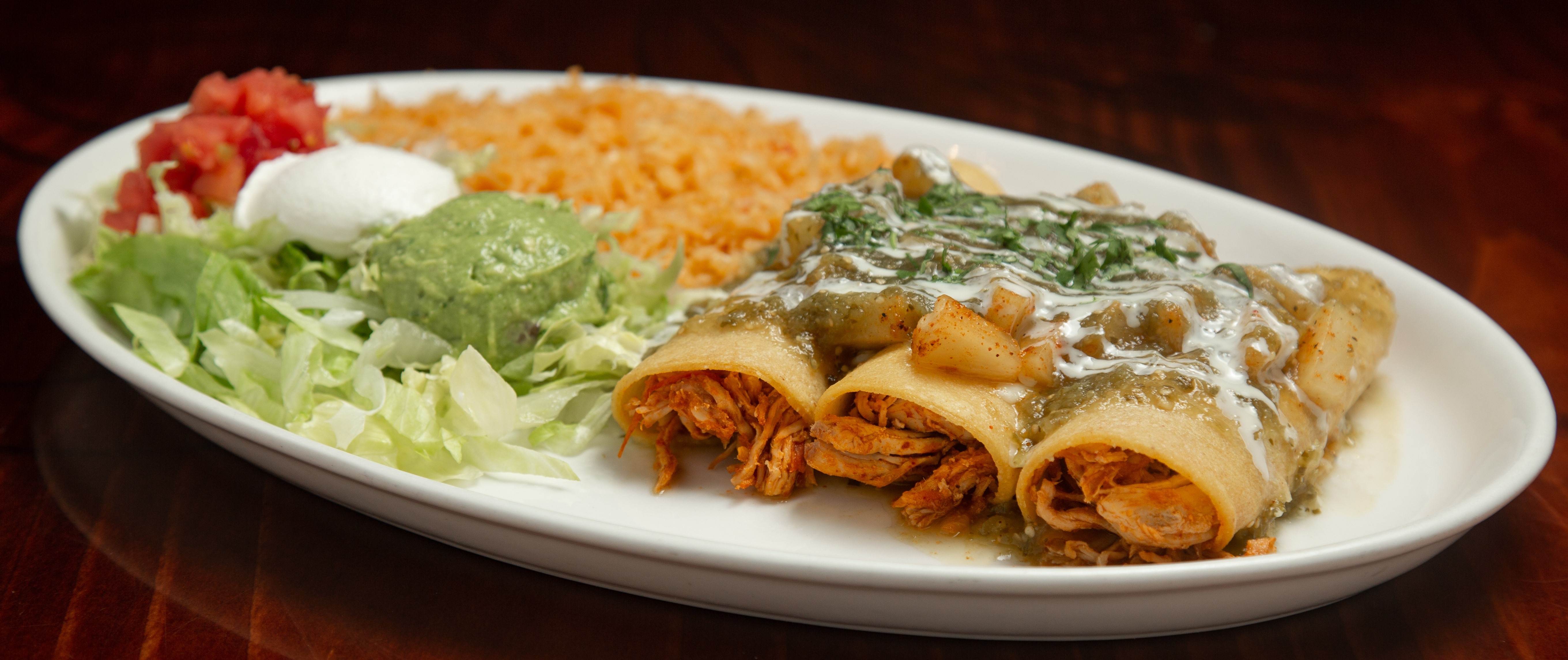 Order Enchiladas Suizas food online from Tito Mexican Restaurant store, Spring Hill on bringmethat.com