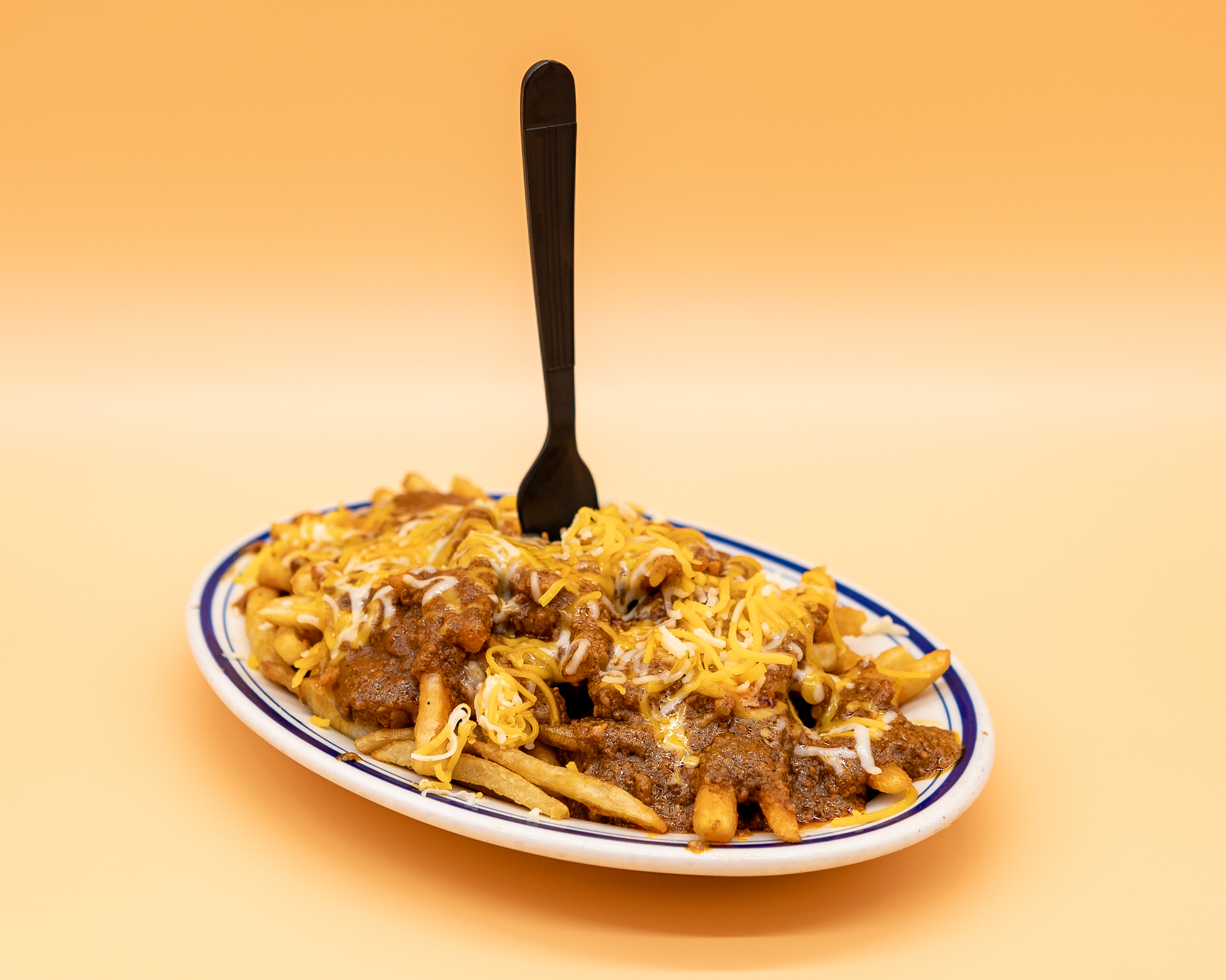 Order Chili-Cheese Fries food online from Manuel Burger store, Los Angeles on bringmethat.com