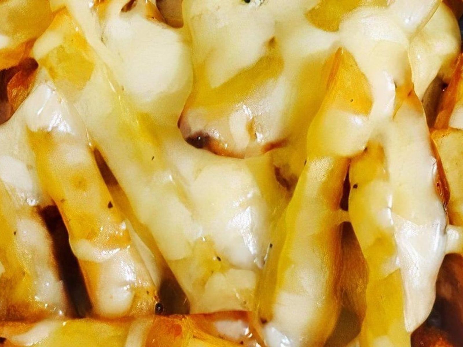 Order CHEESEY FRIES food online from Lisa's Family Pizzeria - Wakefield store, Melrose on bringmethat.com