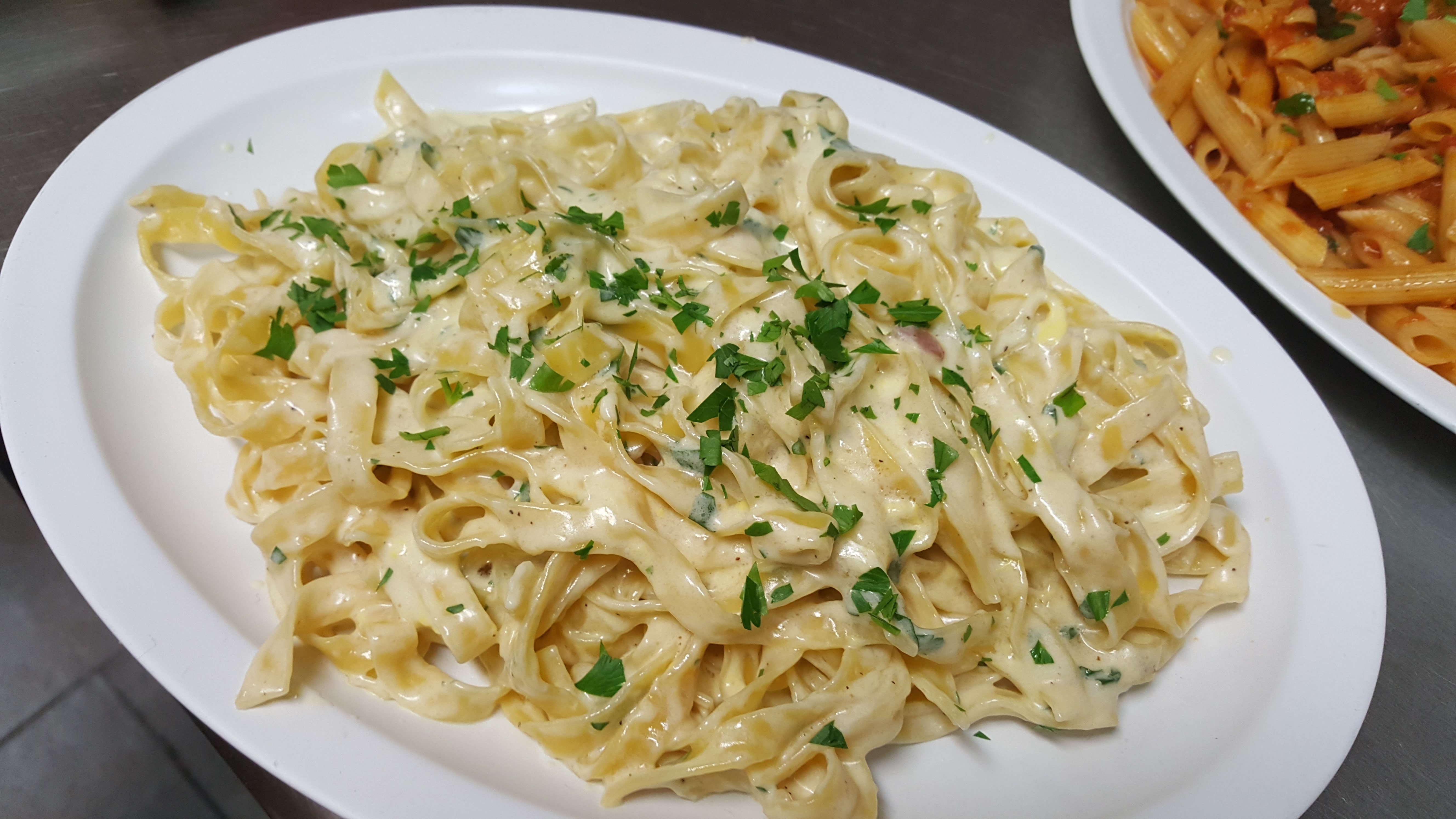 Order Fettuccini Alfredo food online from Pizzarelli's Pizza store, Scarsdale on bringmethat.com