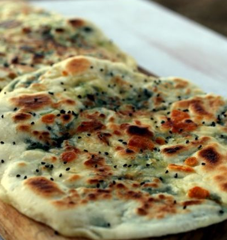 Order Spinach and Garlic Naan food online from Caffe India store, Morristown on bringmethat.com