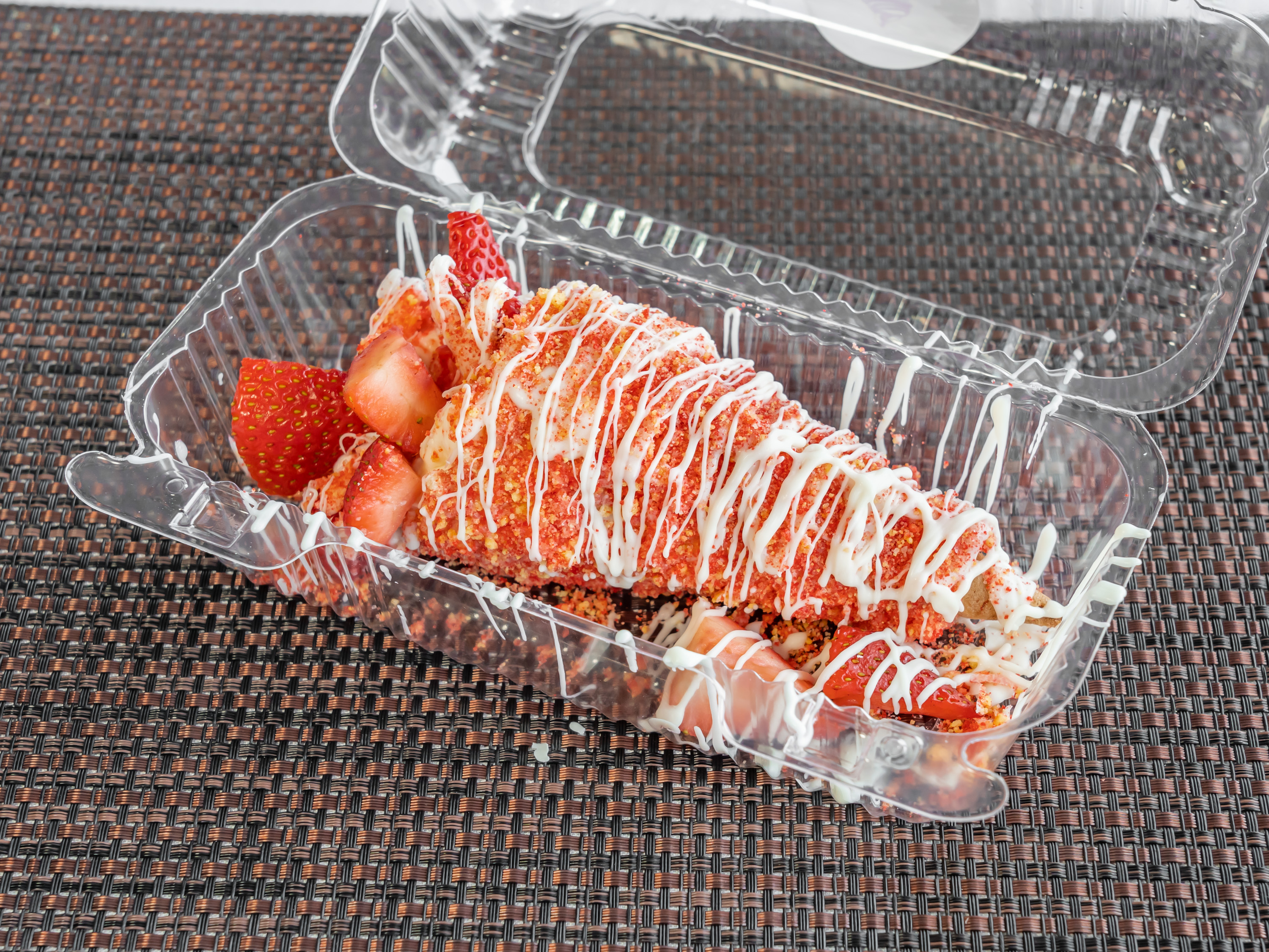 Order Strawberry Crunch Cheesecake Stuffed Cone food online from Sweetalicious Sweets store, Madison Heights on bringmethat.com