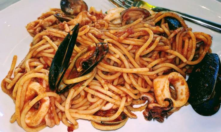 Order Spaghetti Al Cartoccio food online from Nella Pizza E Pasta store, Chicago on bringmethat.com