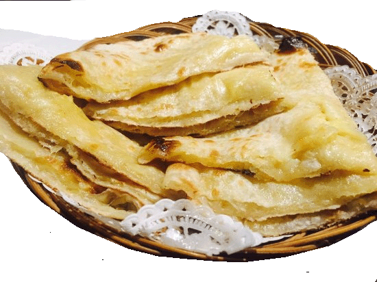 Order Cheese Naan food online from Tiffins India Cafe store, Boulder on bringmethat.com