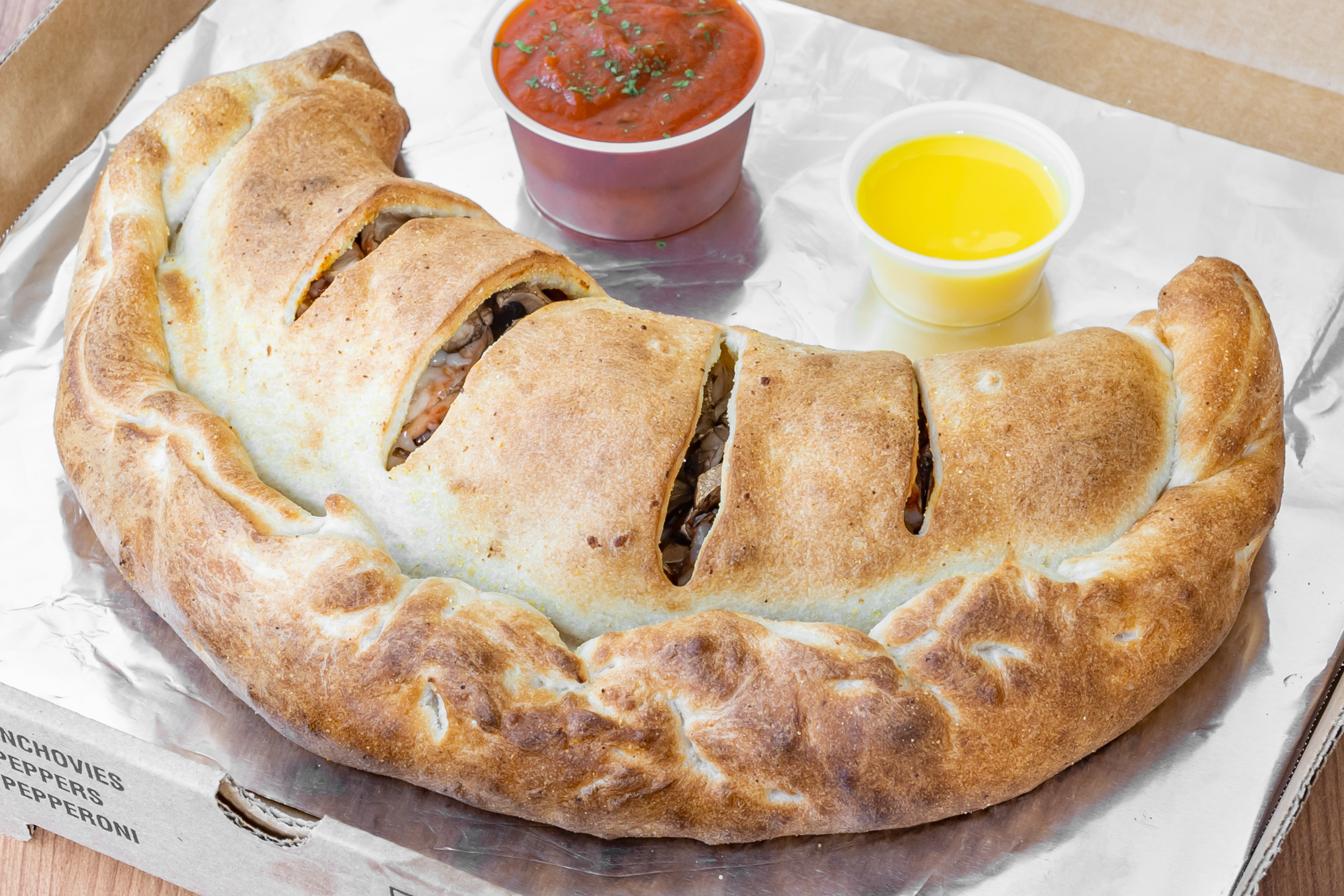 Order Cheese Calzone - Calzone food online from Crown Pizza store, College Park on bringmethat.com