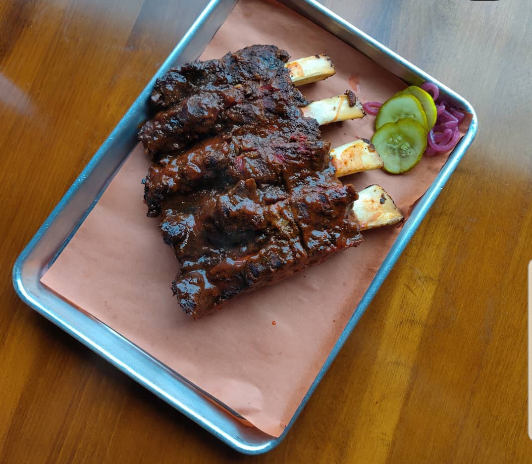 Order Beef Back Ribs 1/2 Slab food online from Noah Smokehouse store, Dearborn on bringmethat.com