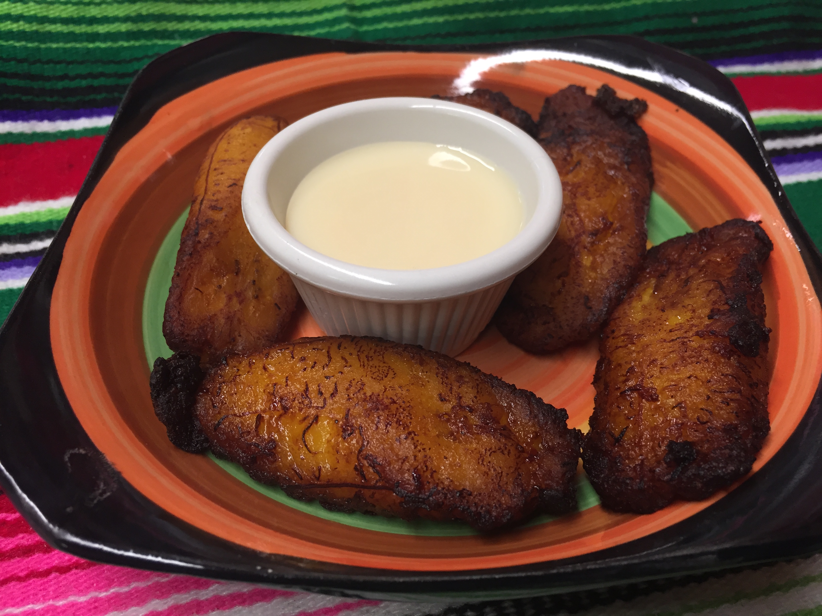 Order FRIED PLANTAINS  food online from Montes Cafe store, Seaside Heights on bringmethat.com