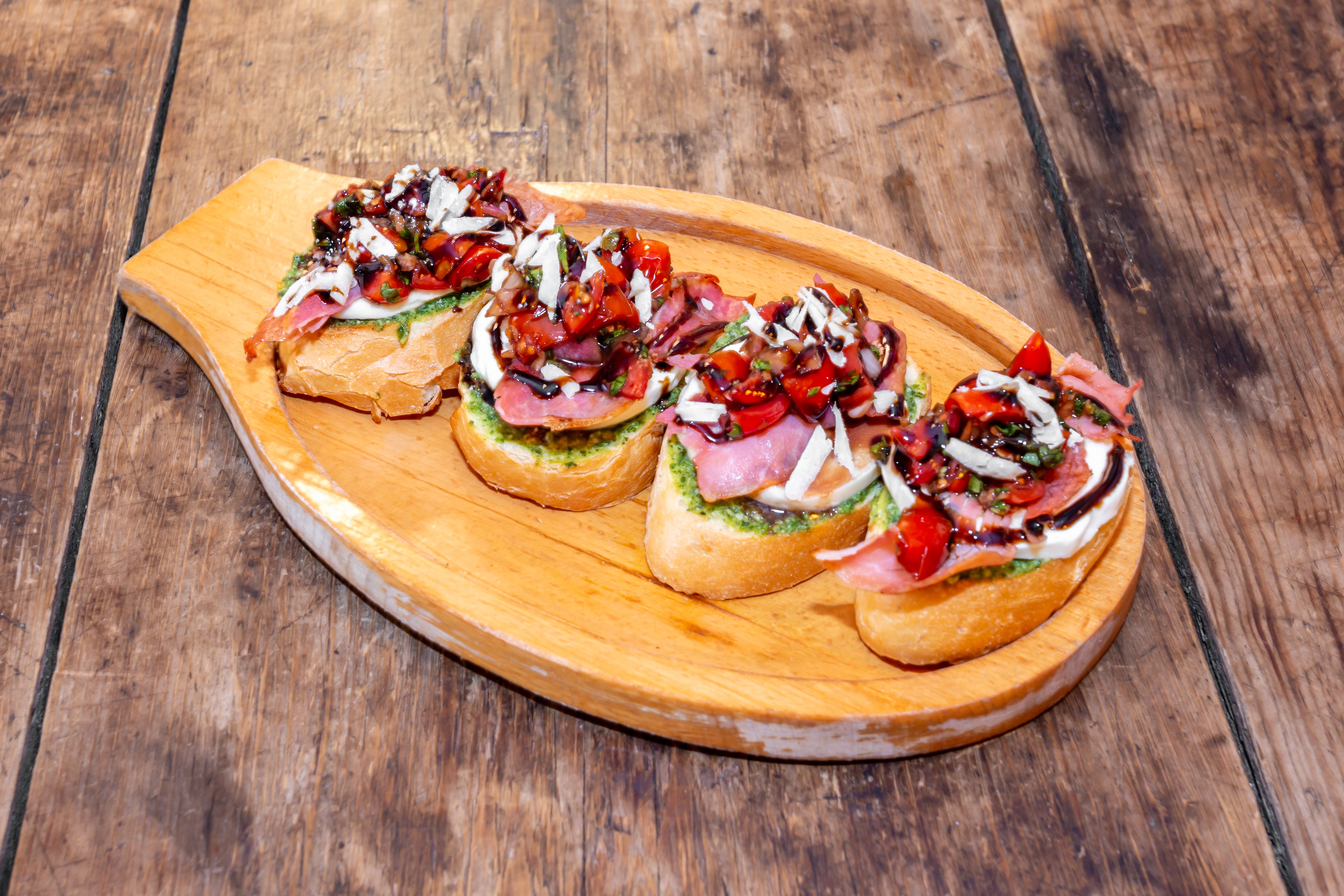 Order Bruschetta - Appetizers food online from Cafe Galleria store, Midway on bringmethat.com