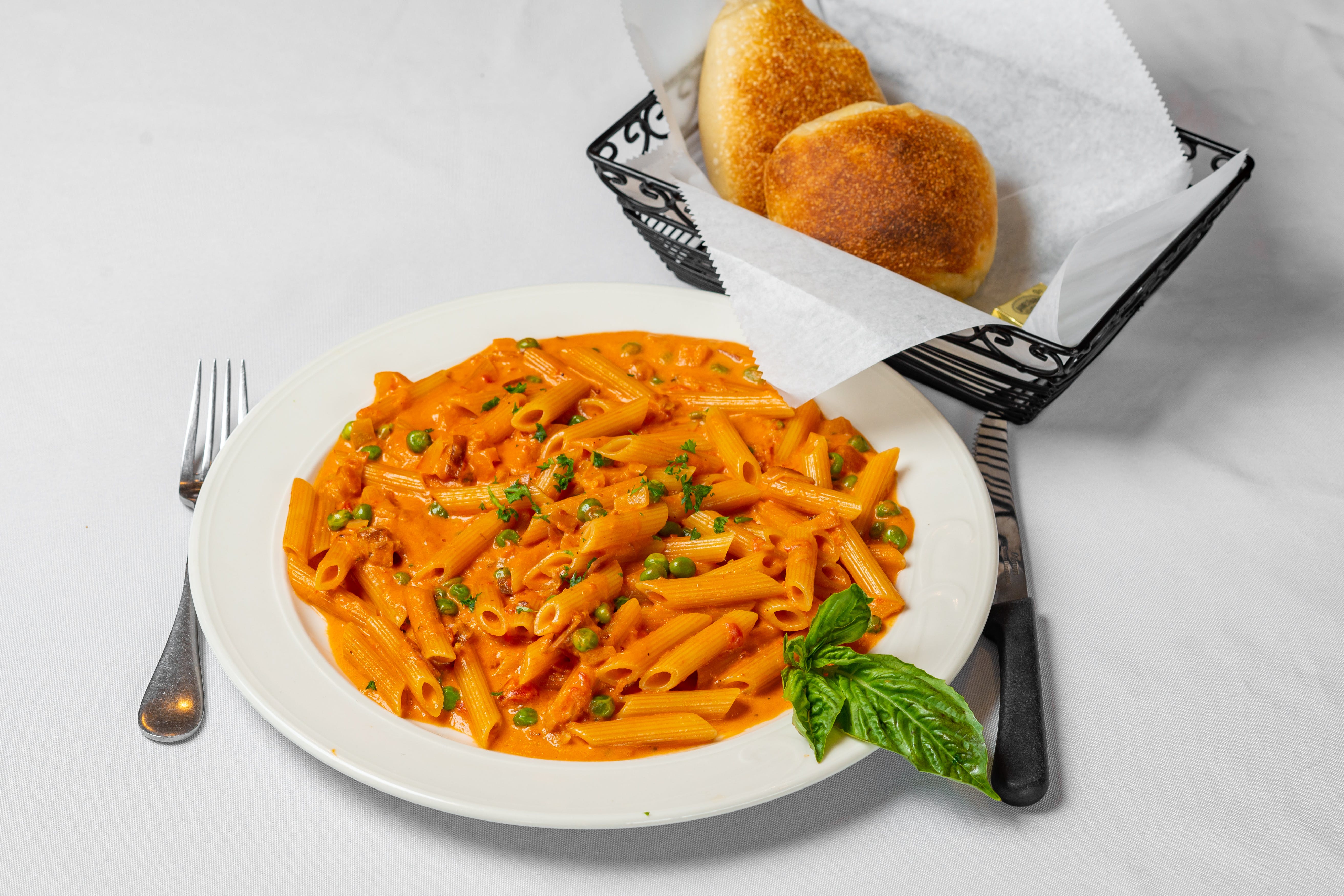 Order Penne alla Vodka - Pasta food online from Pasquale Brick Oven Pizza store, Milltown on bringmethat.com