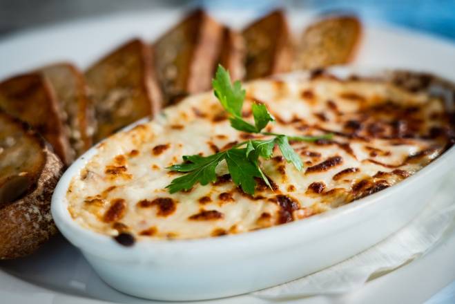 Order Crab & Artichoke Dip food online from The Boathouse at Short Pump store, Richmond on bringmethat.com