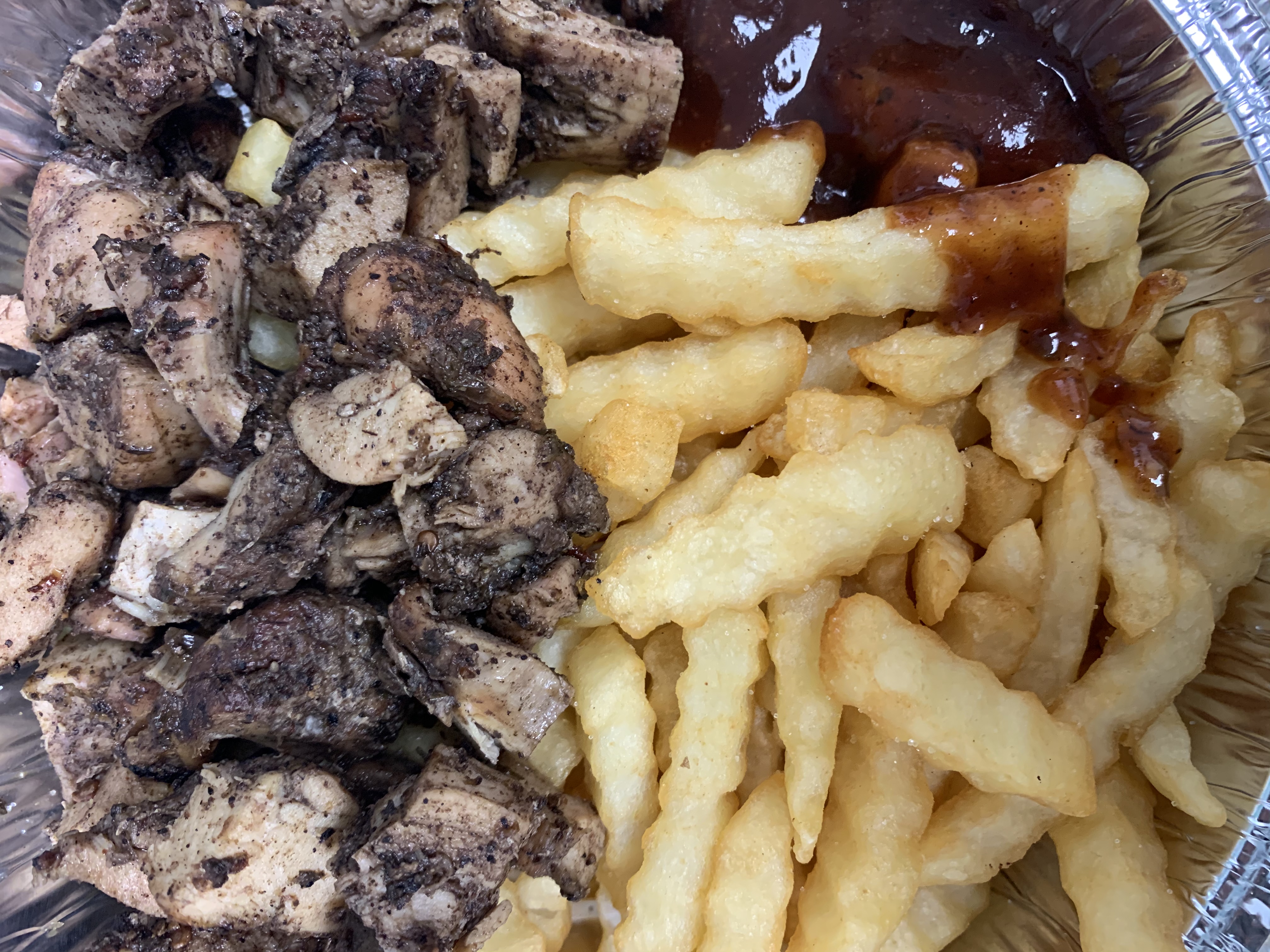 Order Jerk chicken with fries food online from Jaspice store, Netcong on bringmethat.com