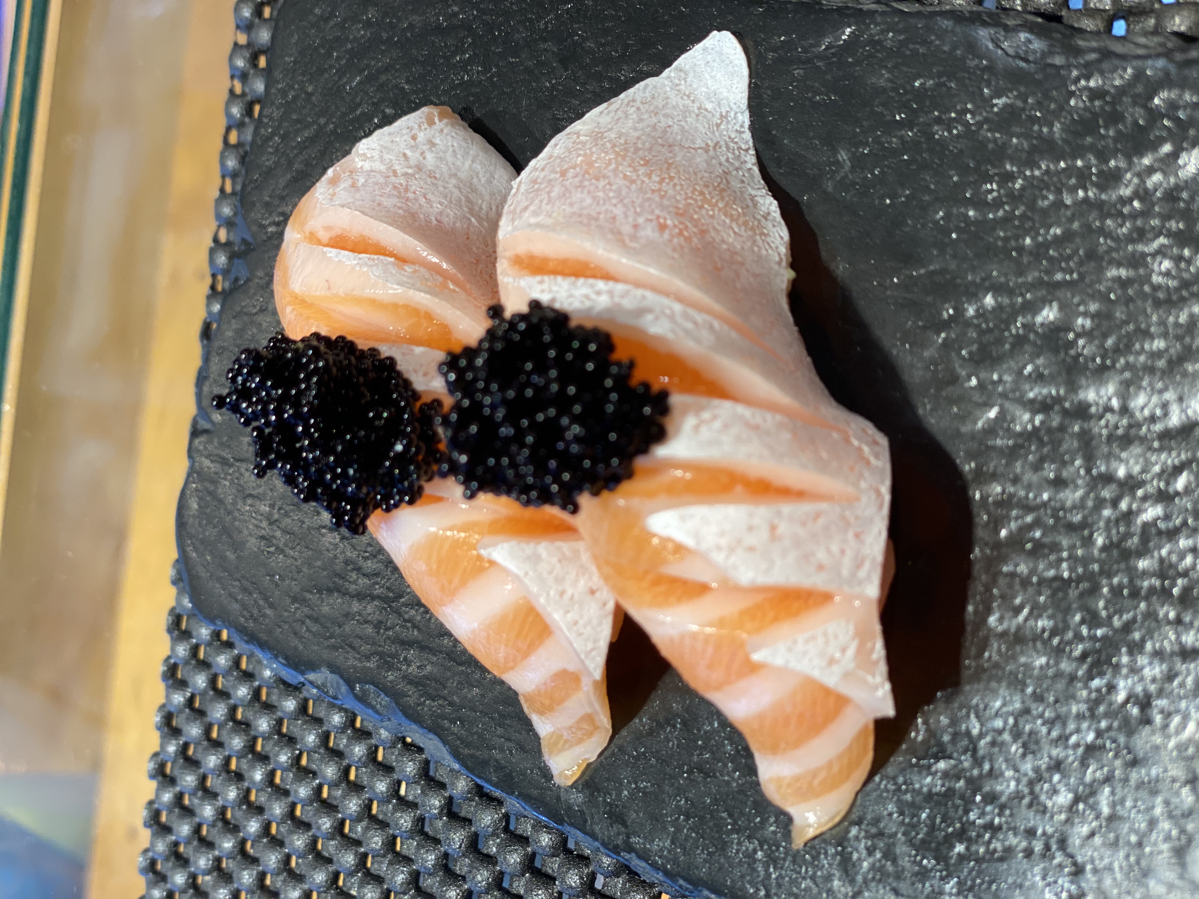Order Salmon belly sushi with black topiko food online from Kazuki Sushi store, Los Angeles on bringmethat.com