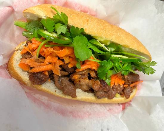 Order  Grilled Pork Banh Mi Poboy & Wonton Soup food online from Fusion Cafe store, Metairie on bringmethat.com