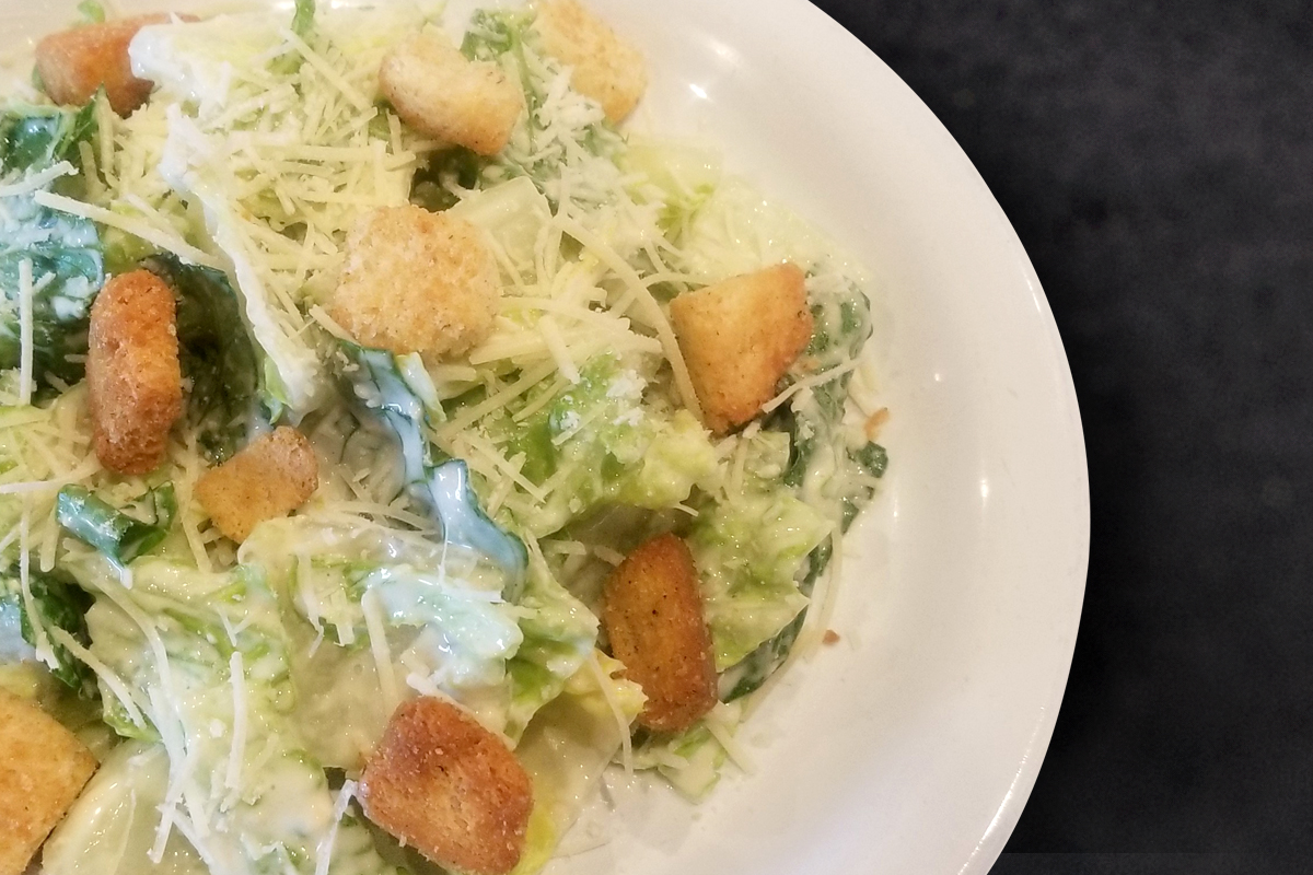 Order Caesar Salad Family Size  food online from Round Table Pizza store, Spokane on bringmethat.com