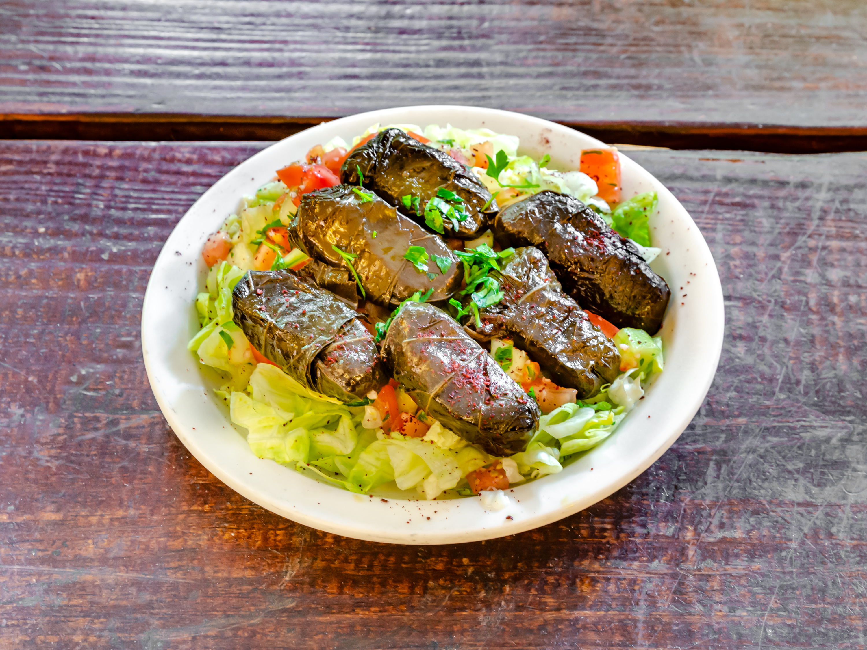 Order 6 Piece Grape Leaves food online from Falafel on broadway store, New York on bringmethat.com