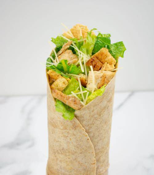 Order Garlic & Herb Chicken Caesar Wrap food online from The Salad Station - Covington store, Covington on bringmethat.com