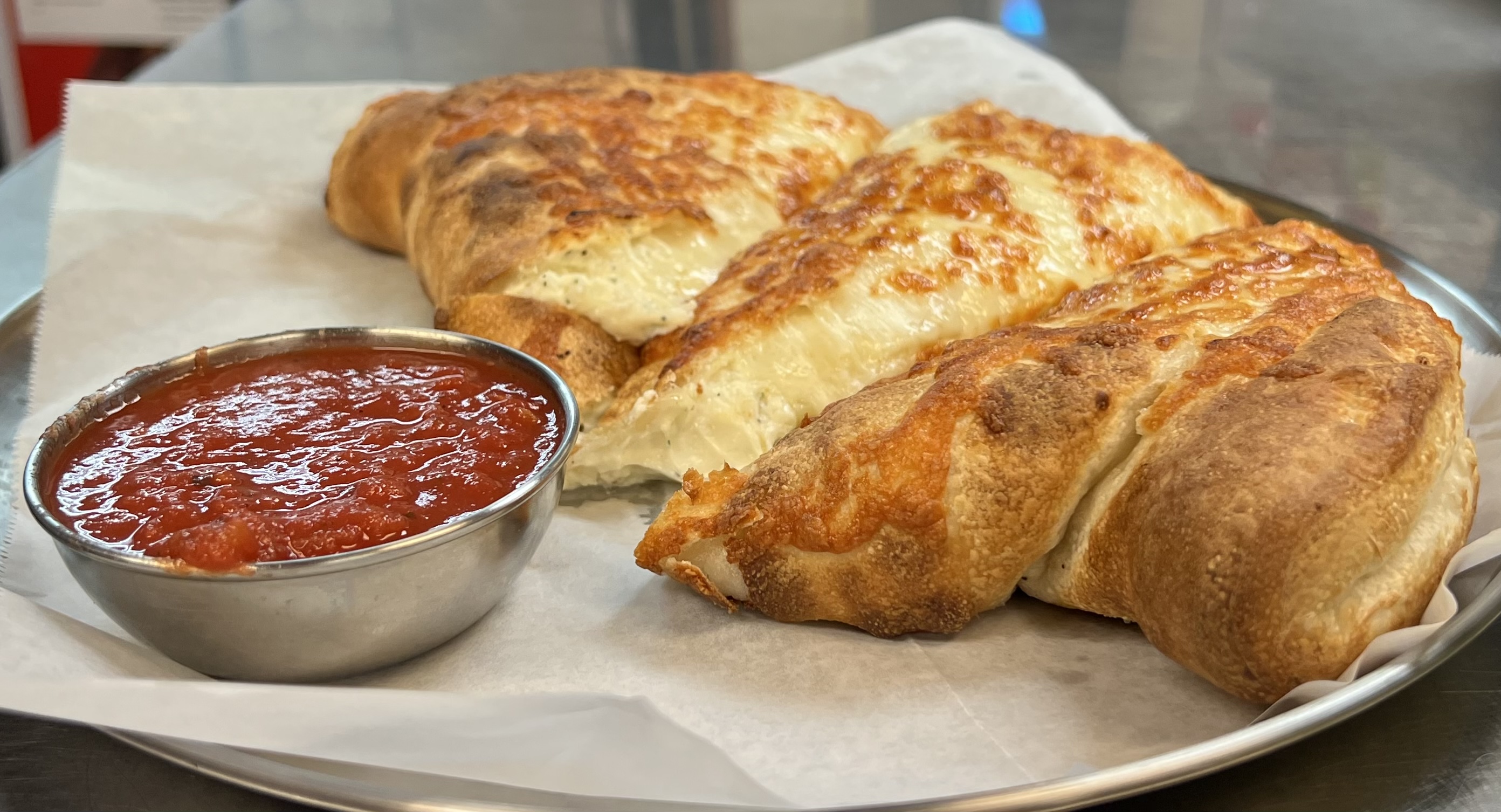 Order 4 Cheese Calzone food online from Luisa's Italian Pizzeria store, Manchester on bringmethat.com