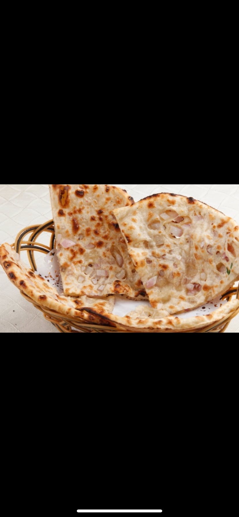 Order Onion Nan Bread - Bread food online from Ajanta Restaurant store, Kettering on bringmethat.com