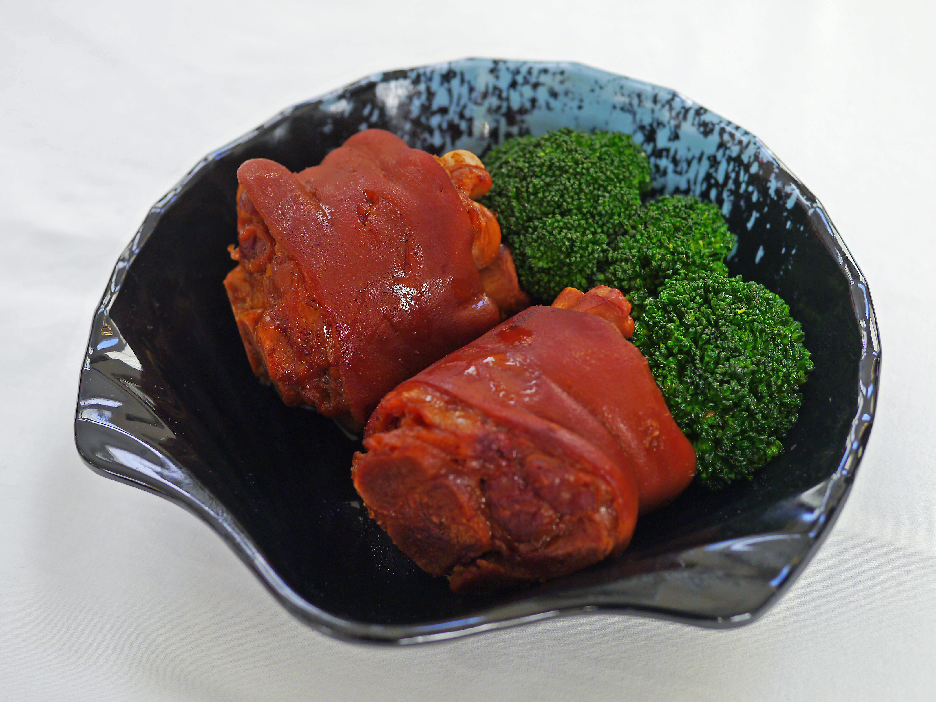 Order 9. Marinated Pork Hand 滷豬腳 food online from BD Cafe store, Chino on bringmethat.com