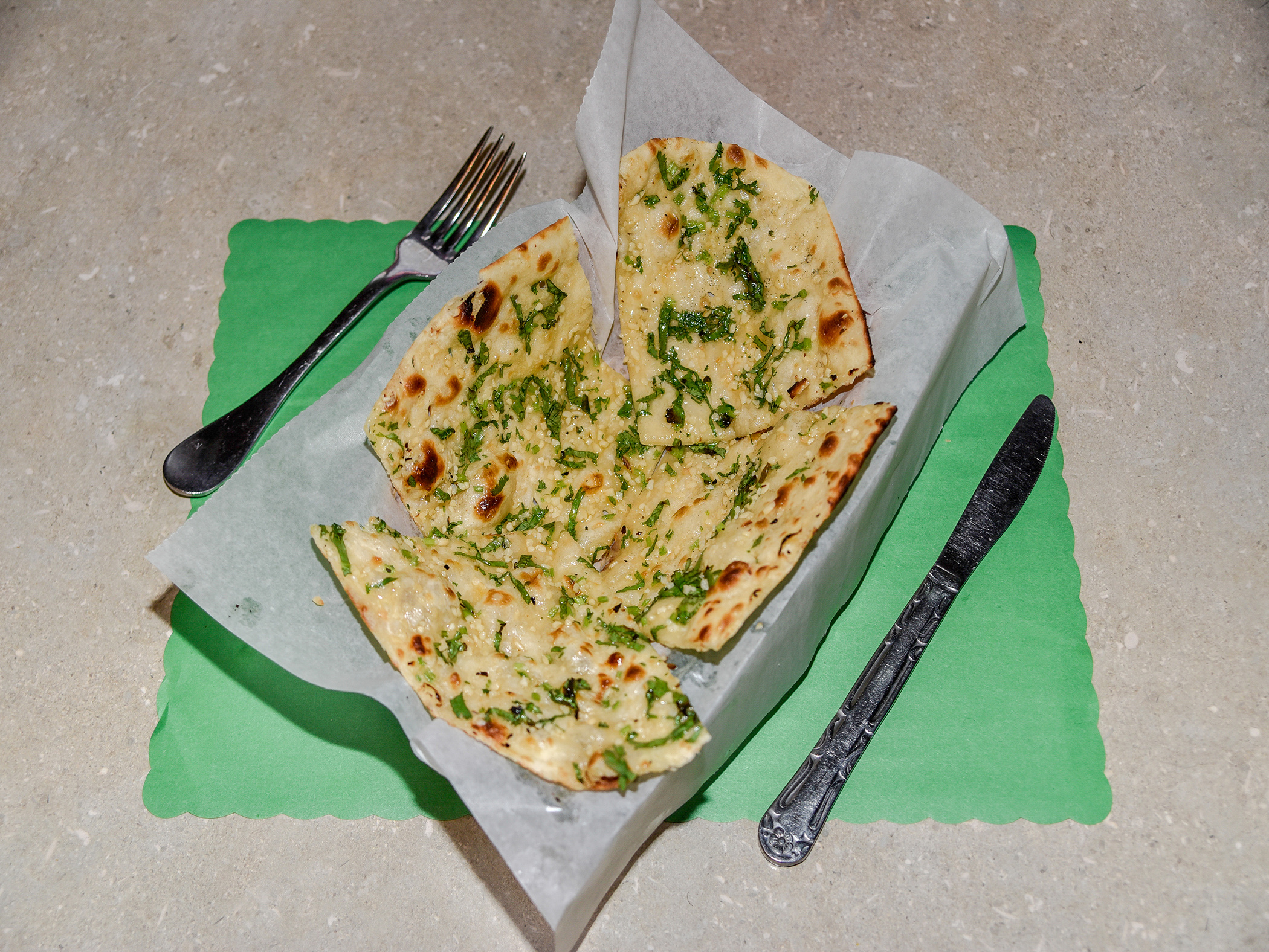 Order Garlic Naan food online from India Palace store, Franklin on bringmethat.com