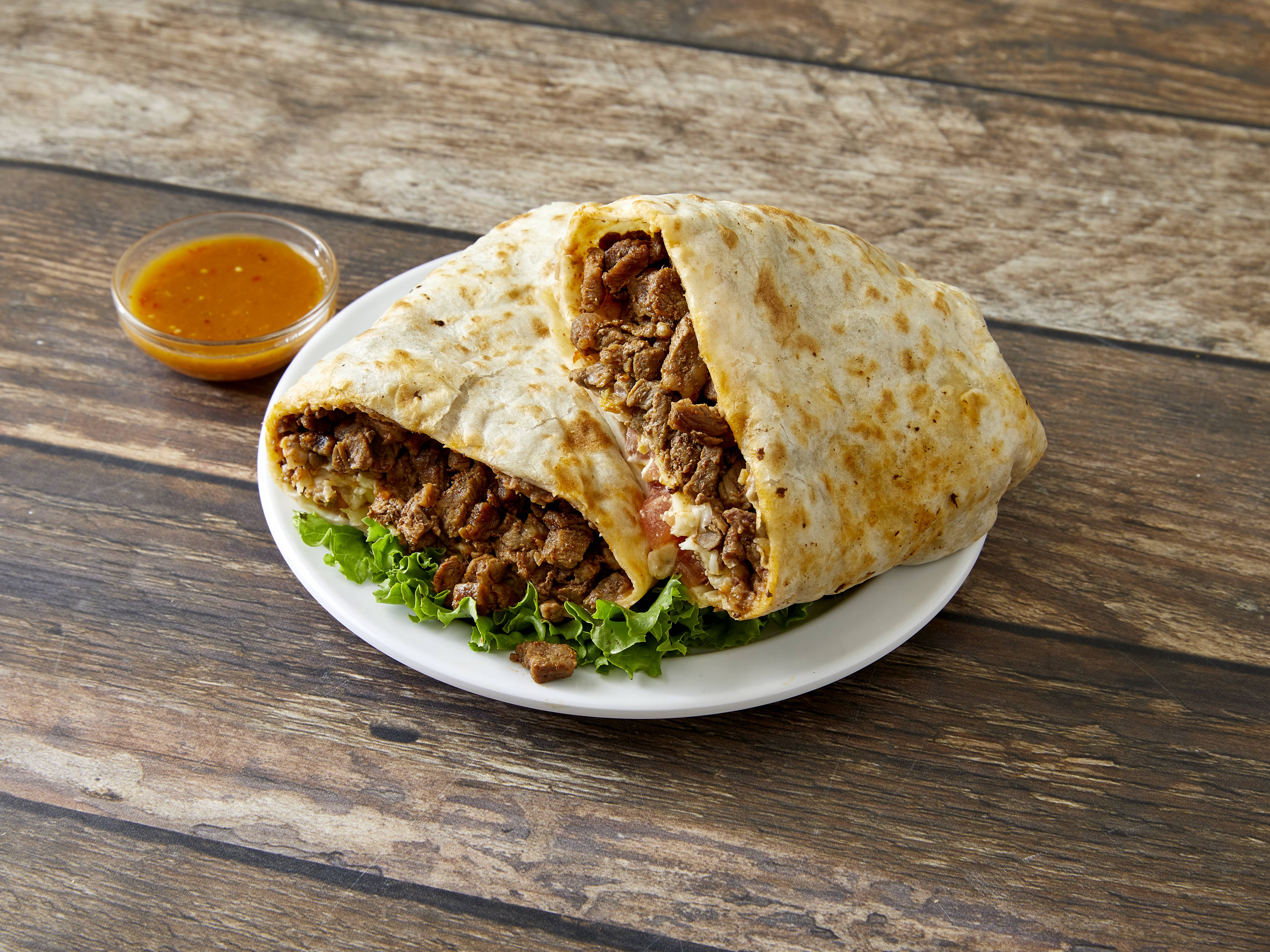 Order Steak Burrito food online from 4 Hermanos Too store, Chicago on bringmethat.com