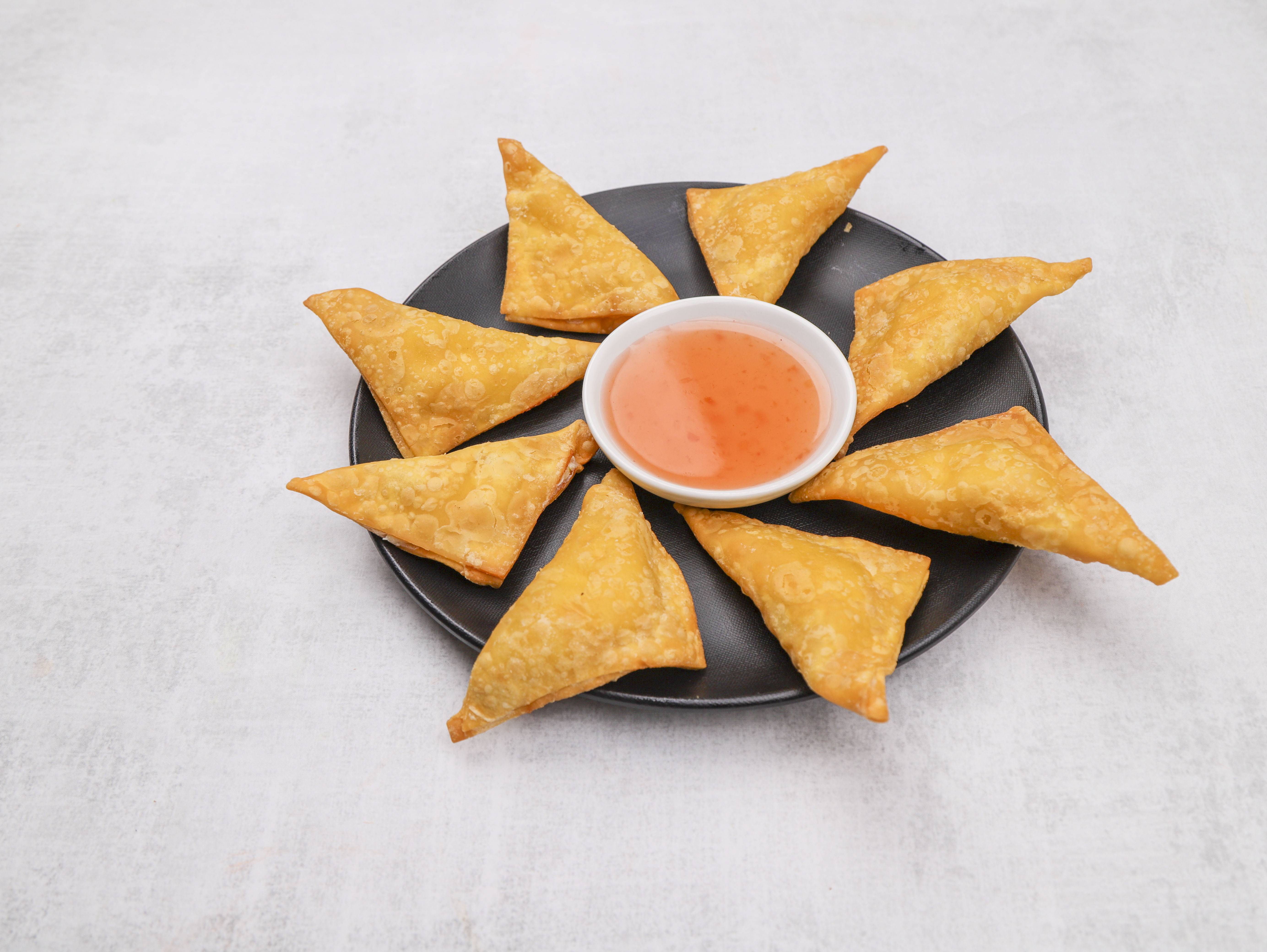 Order 9. Crab Rangoon food online from Lucky House store, Peabody on bringmethat.com