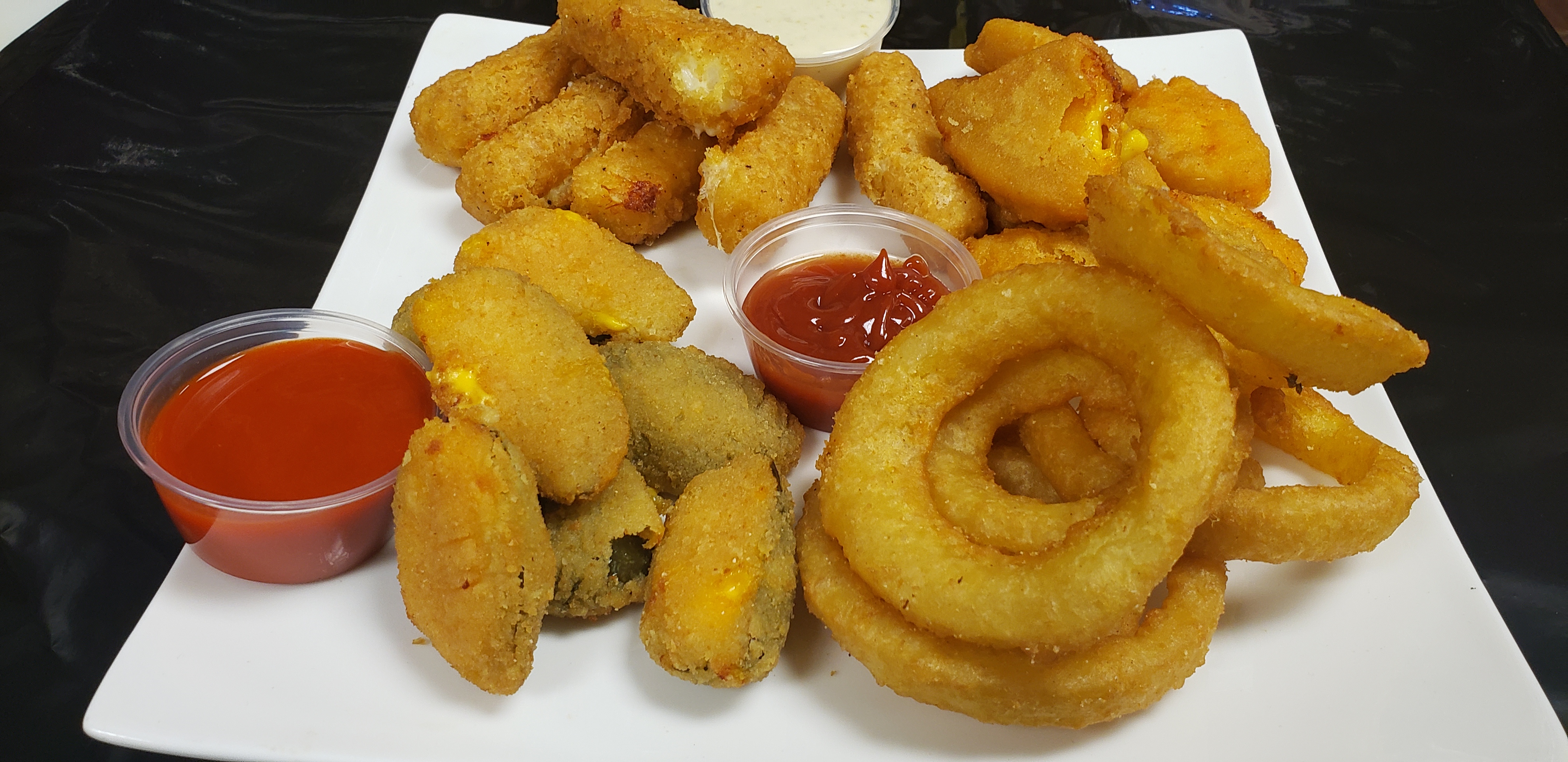 Order Jalapeno Poppers food online from Fries To Wings store, Aurora on bringmethat.com