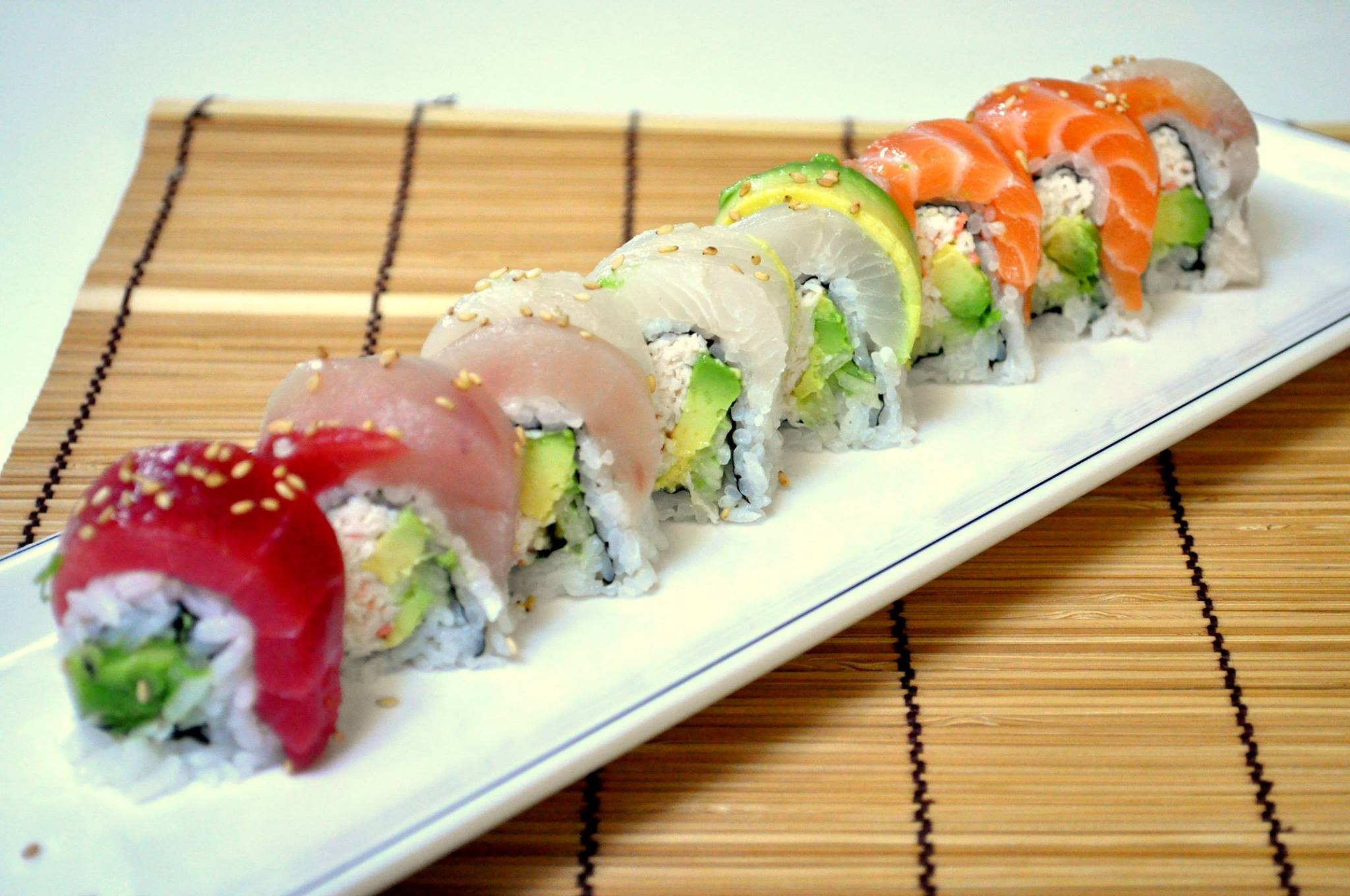 Order R1. Rainbow Roll food online from Nomura Sushi store, Los Angeles on bringmethat.com