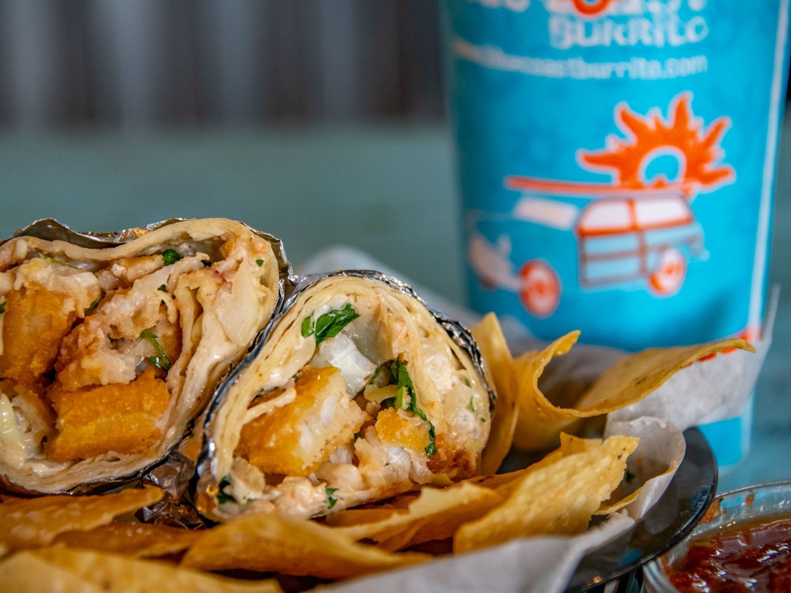 Order Baja Style Fish Burrito food online from Blue Coast Burrito store, Nashville on bringmethat.com