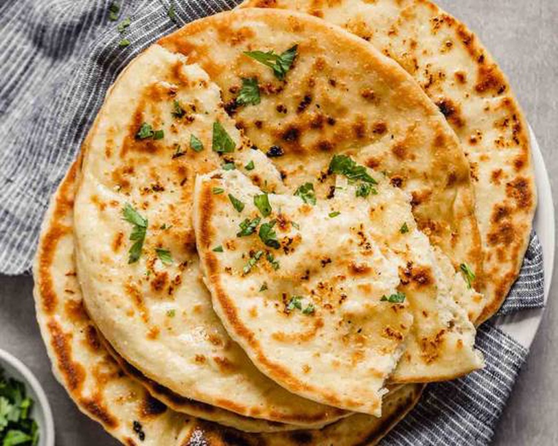 Order Mint Naan food online from Deccan House store, San Francisco on bringmethat.com