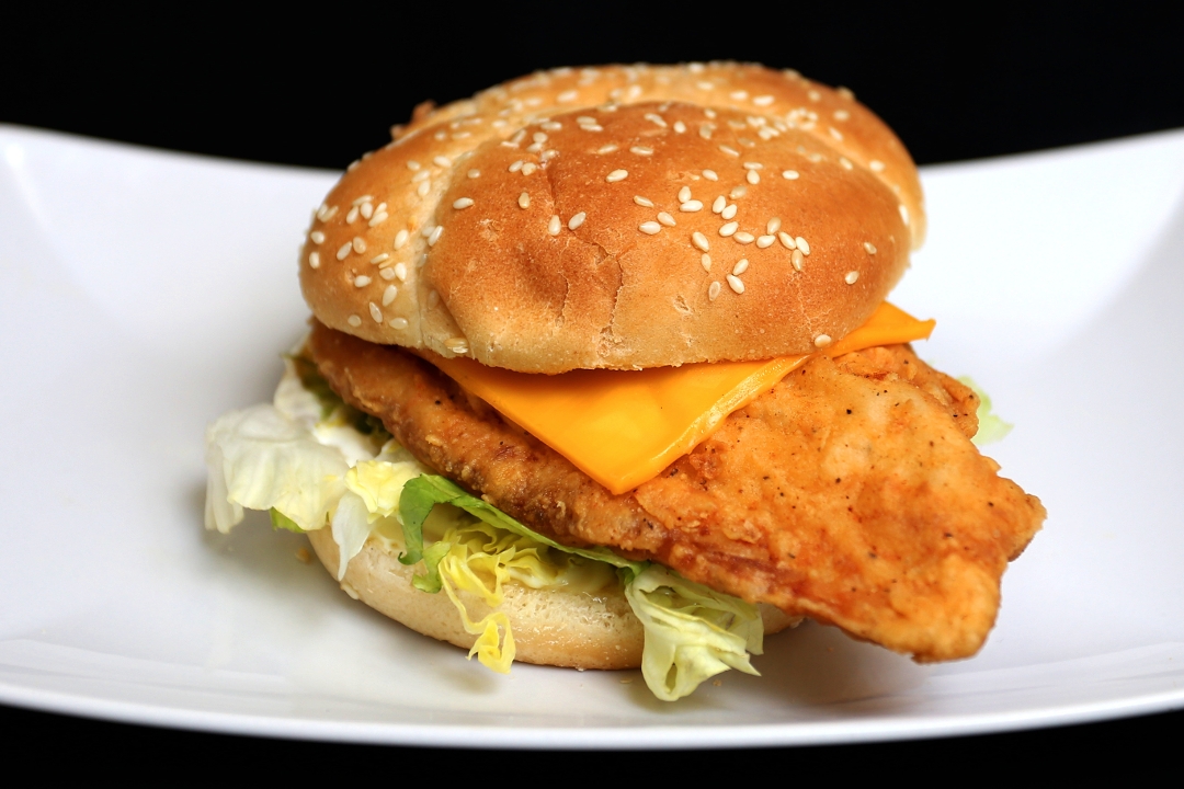 Order Tilapia Fish Sandwich food online from Two Brothers Chicken store, Woodbridge on bringmethat.com