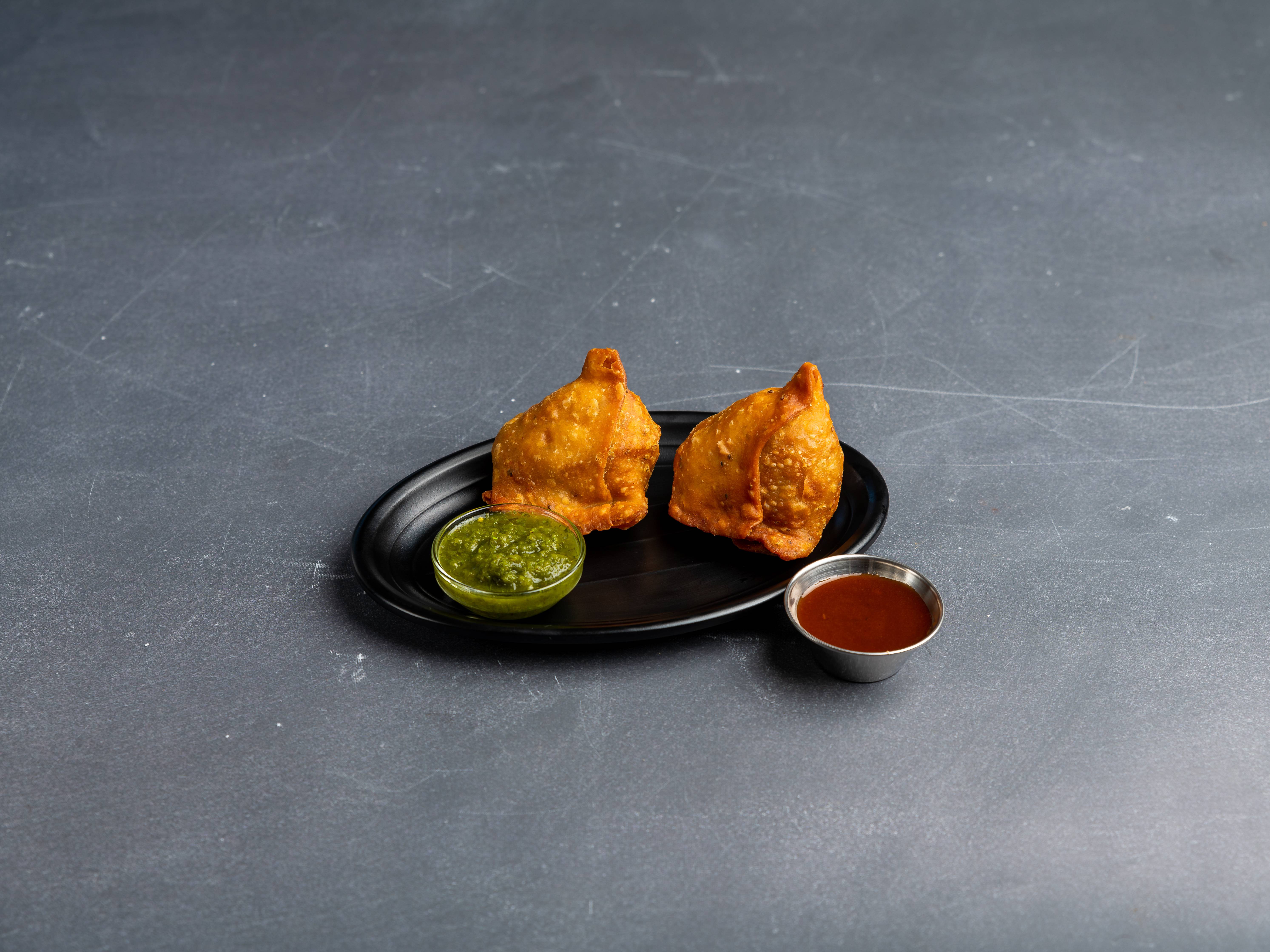 Order Vegetable Samosas food online from India Palace store, Cockeysville on bringmethat.com