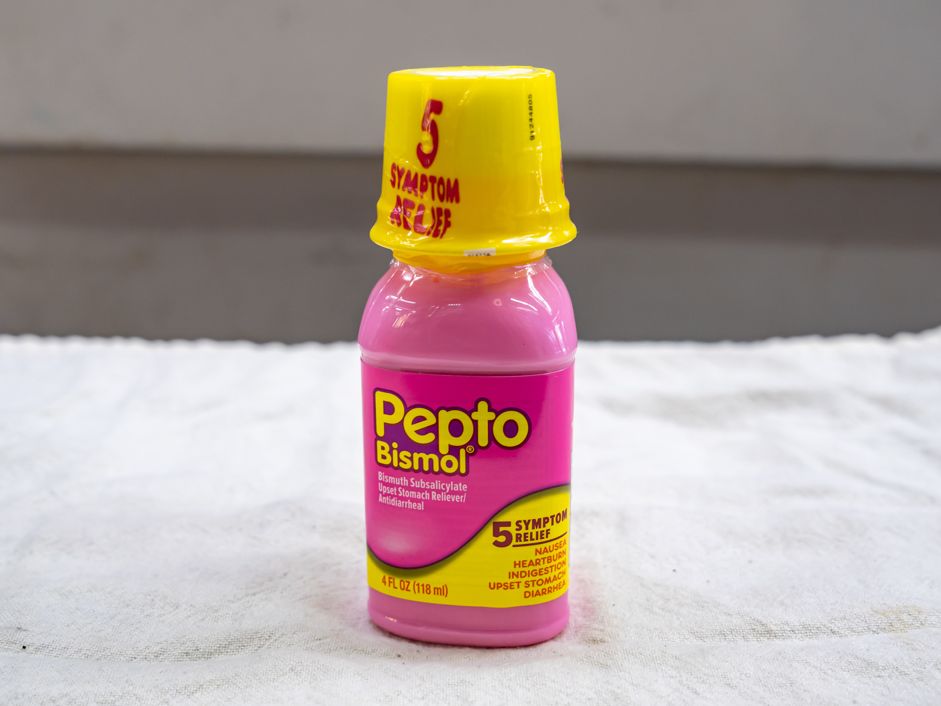 Order Pepto Bismol -4oz food online from Quentin Deli and Grocery store, Brooklyn on bringmethat.com