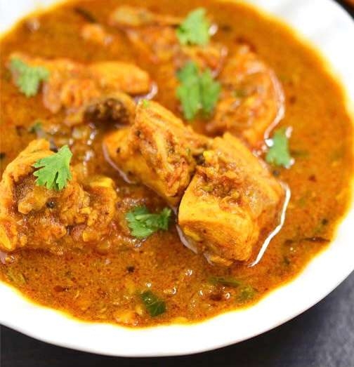 Order Andhra Chicken Curry food online from Minerva Indian Cuisine store, Gaithersburg on bringmethat.com