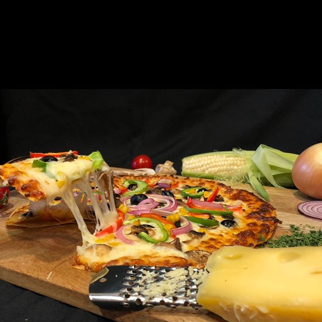 Order 10" Roobic’s Special Pizza food online from Roobic Cafe store, Glendale on bringmethat.com