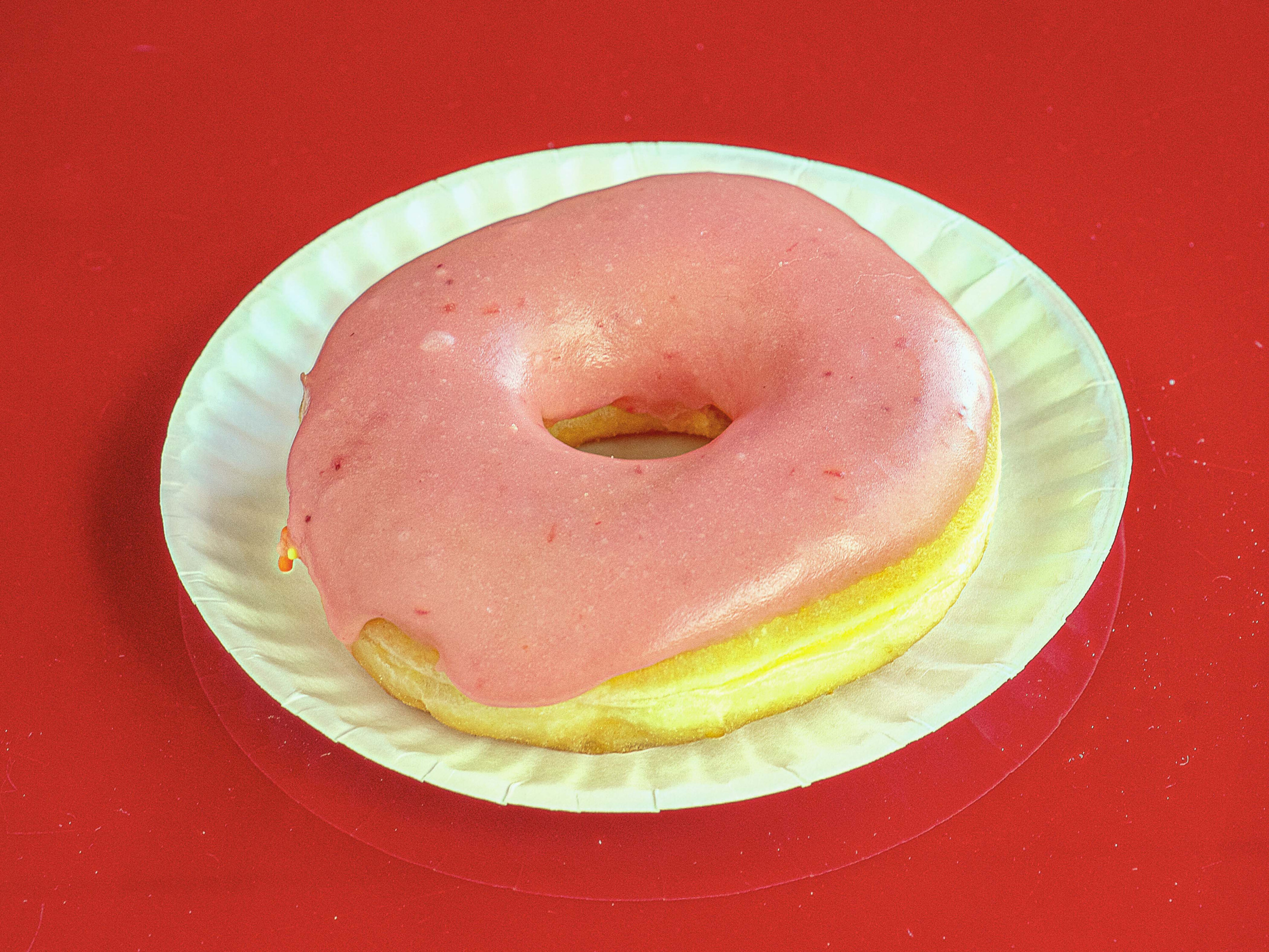 Order Strawberry Iced Yeast Donut food online from Hammer Donuts store, West Lafayette on bringmethat.com