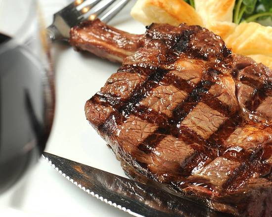 Order 16 oz. Dry-Aged bone-in Fillet mignon food online from Kinzie chophouse store, Chicago on bringmethat.com