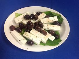 Order Feta and Olives food online from Atheneos Greek Village Cafe store, Mesquite on bringmethat.com