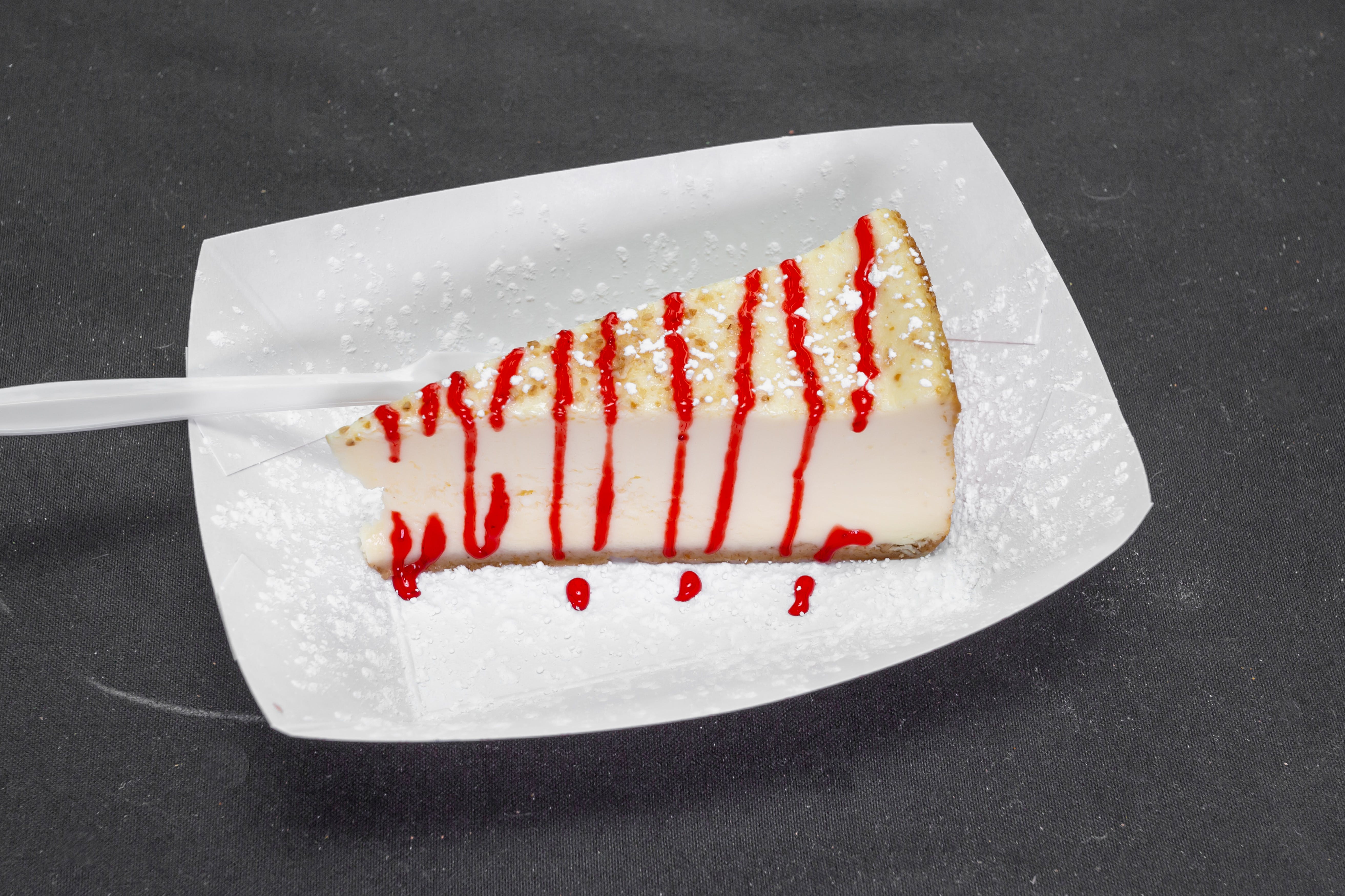 Order New York Style Cheesecake - Dessert food online from Pujols Pizzeria store, Bethlehem on bringmethat.com