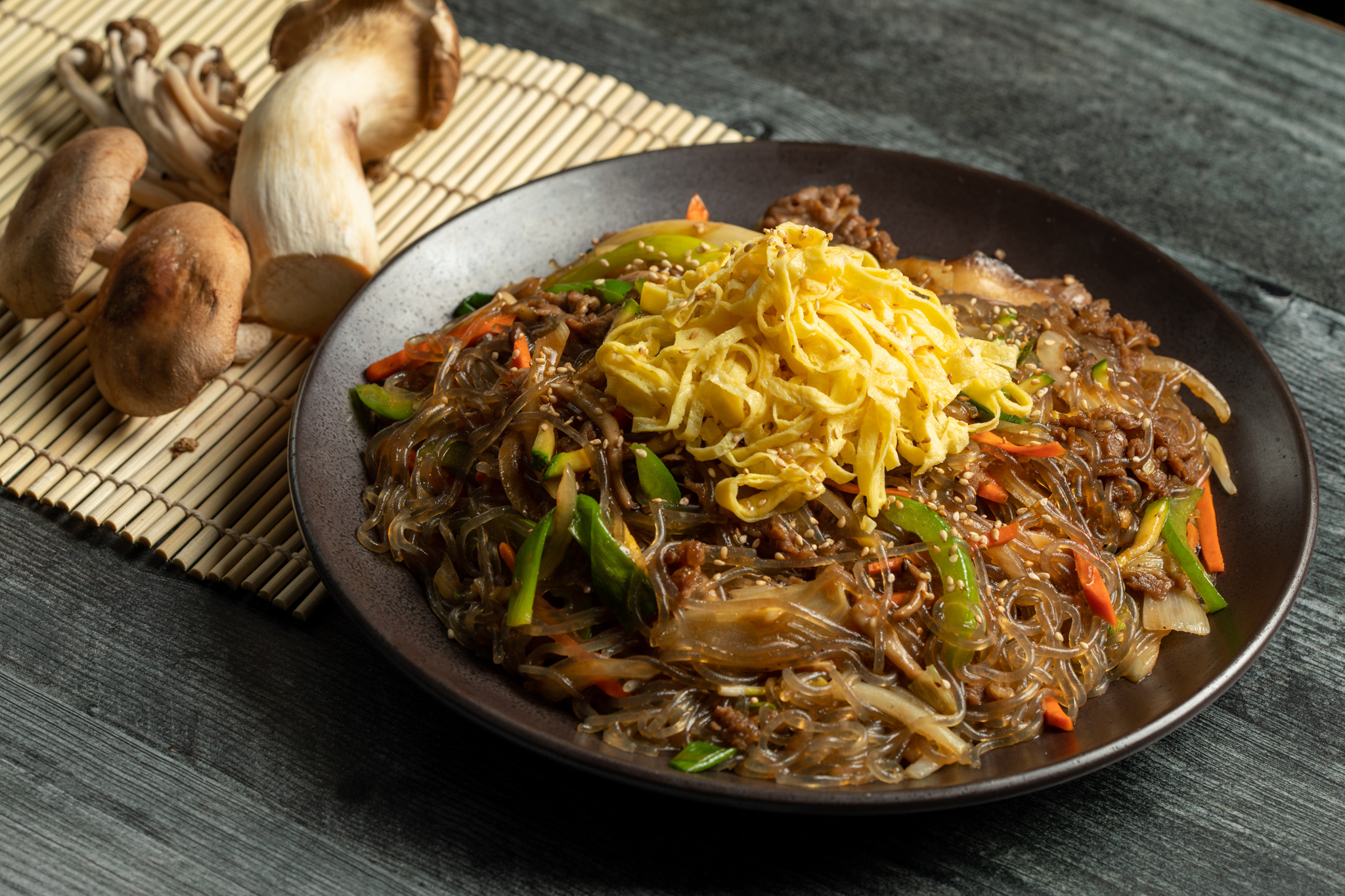 Order Stir Fried Glass Noodle 버섯 불고기 잡채 food online from Mui store, New York on bringmethat.com