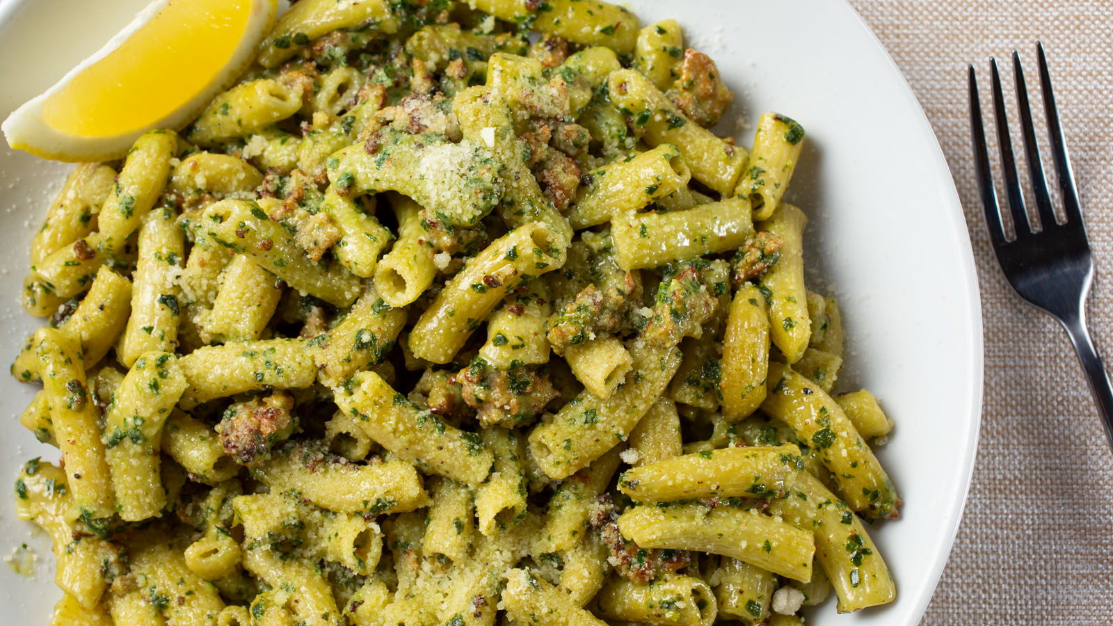 Order Pesto Pasta food online from TJ's Woodfire Pizza store, San Clemente on bringmethat.com