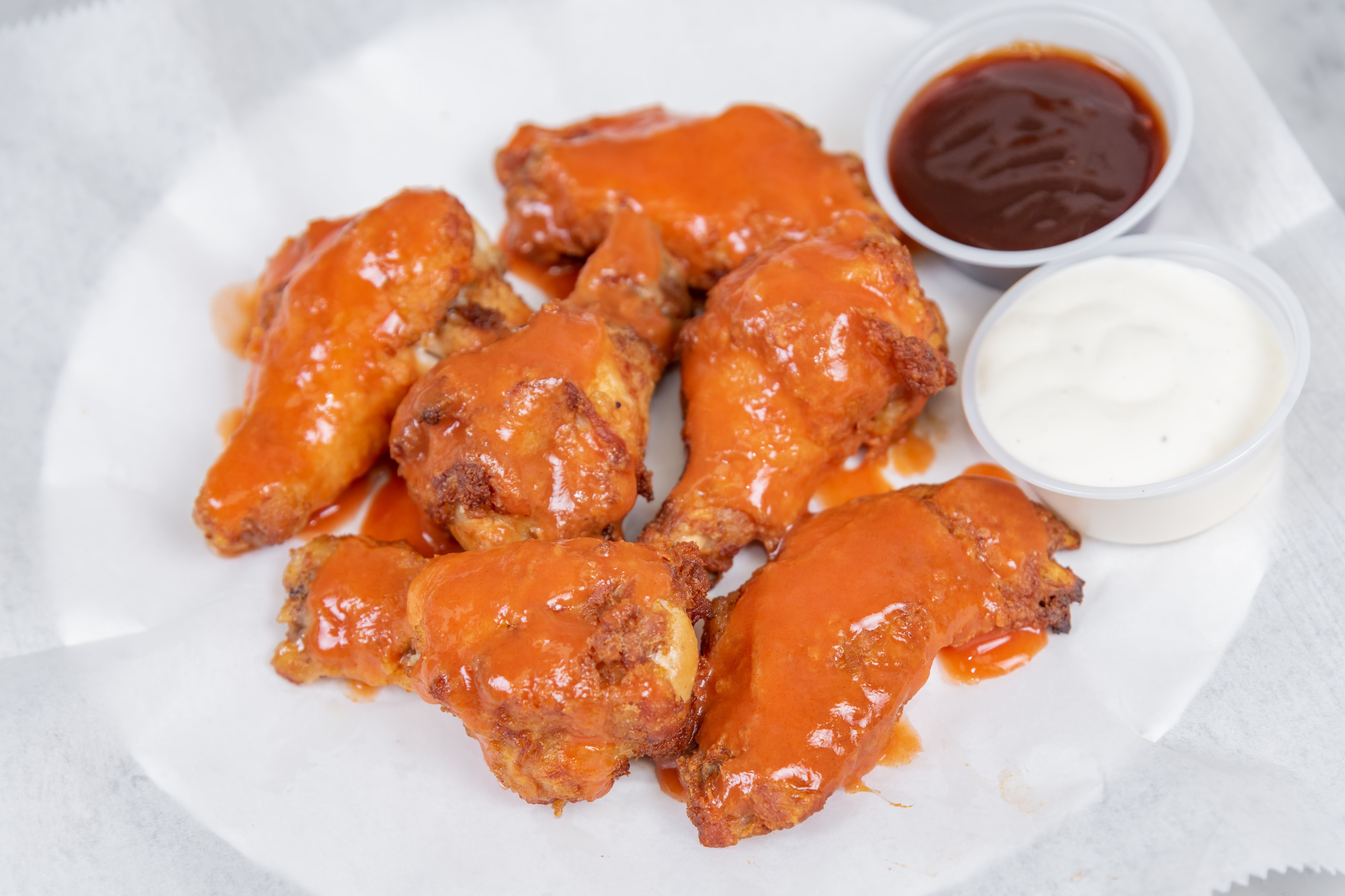 Order Chicken Wings - 6 Pieces food online from 99 Cent Delicious Pizza store, New York on bringmethat.com