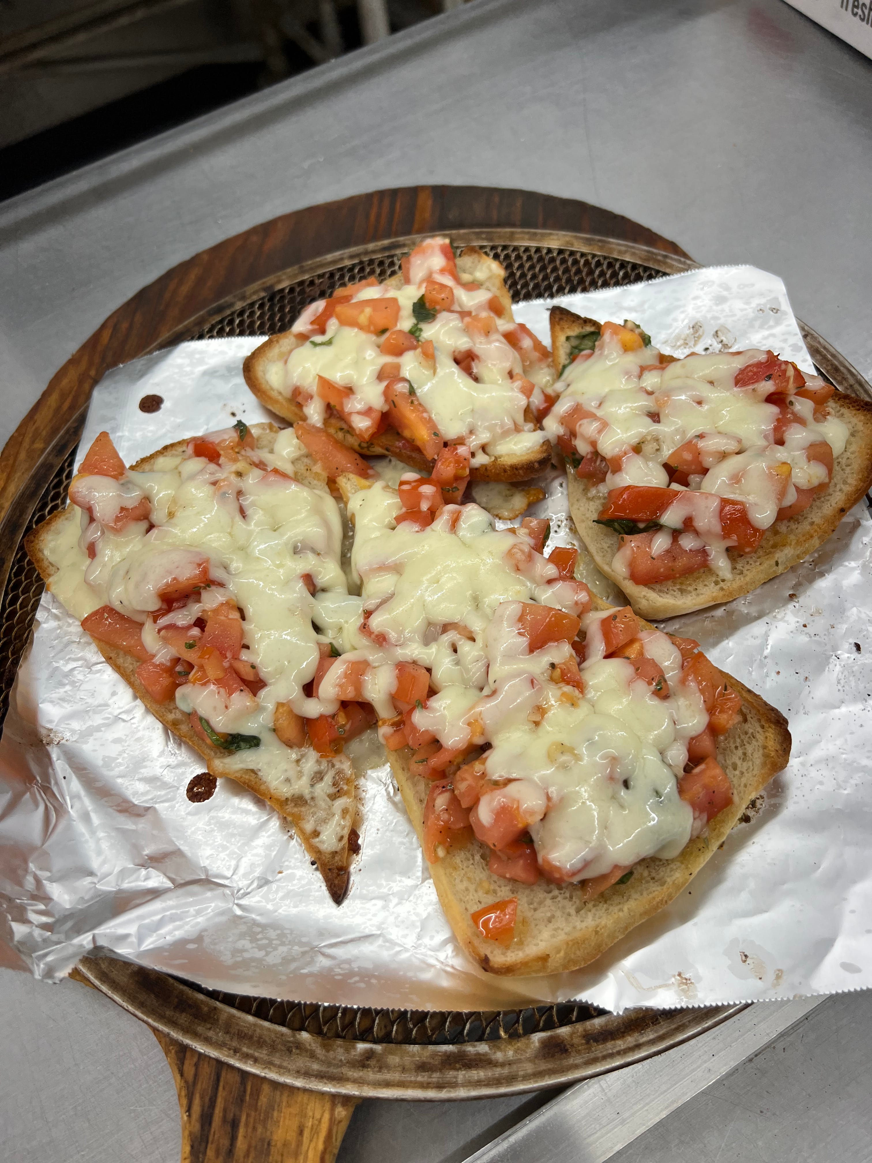Order Bruschetta with Cheese - Appetizer food online from Andre's Pizza store, Oxford on bringmethat.com