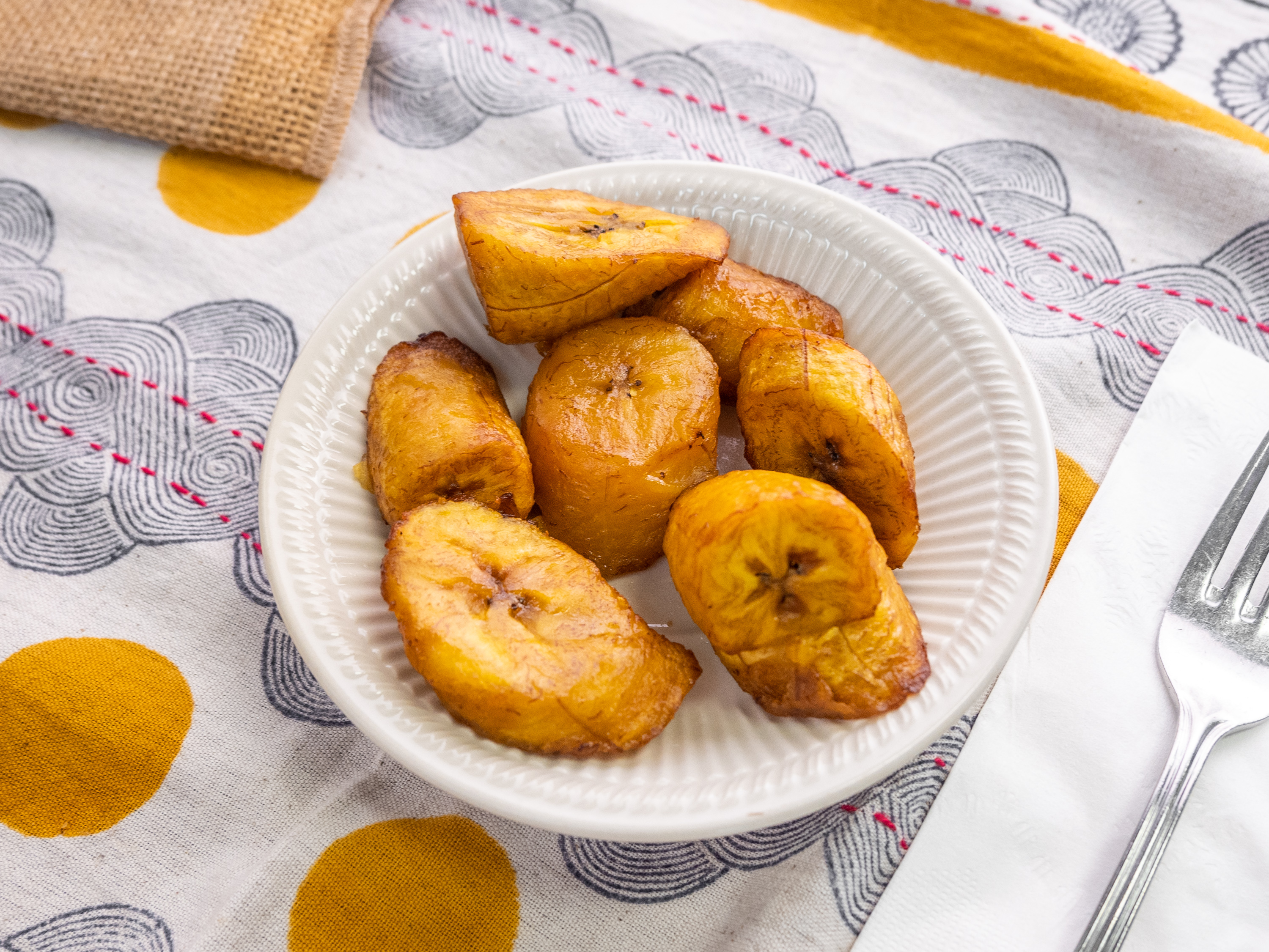 Order 3. Fried Plantain food online from A&H African & Jamaican Restaurant store, Clementon on bringmethat.com