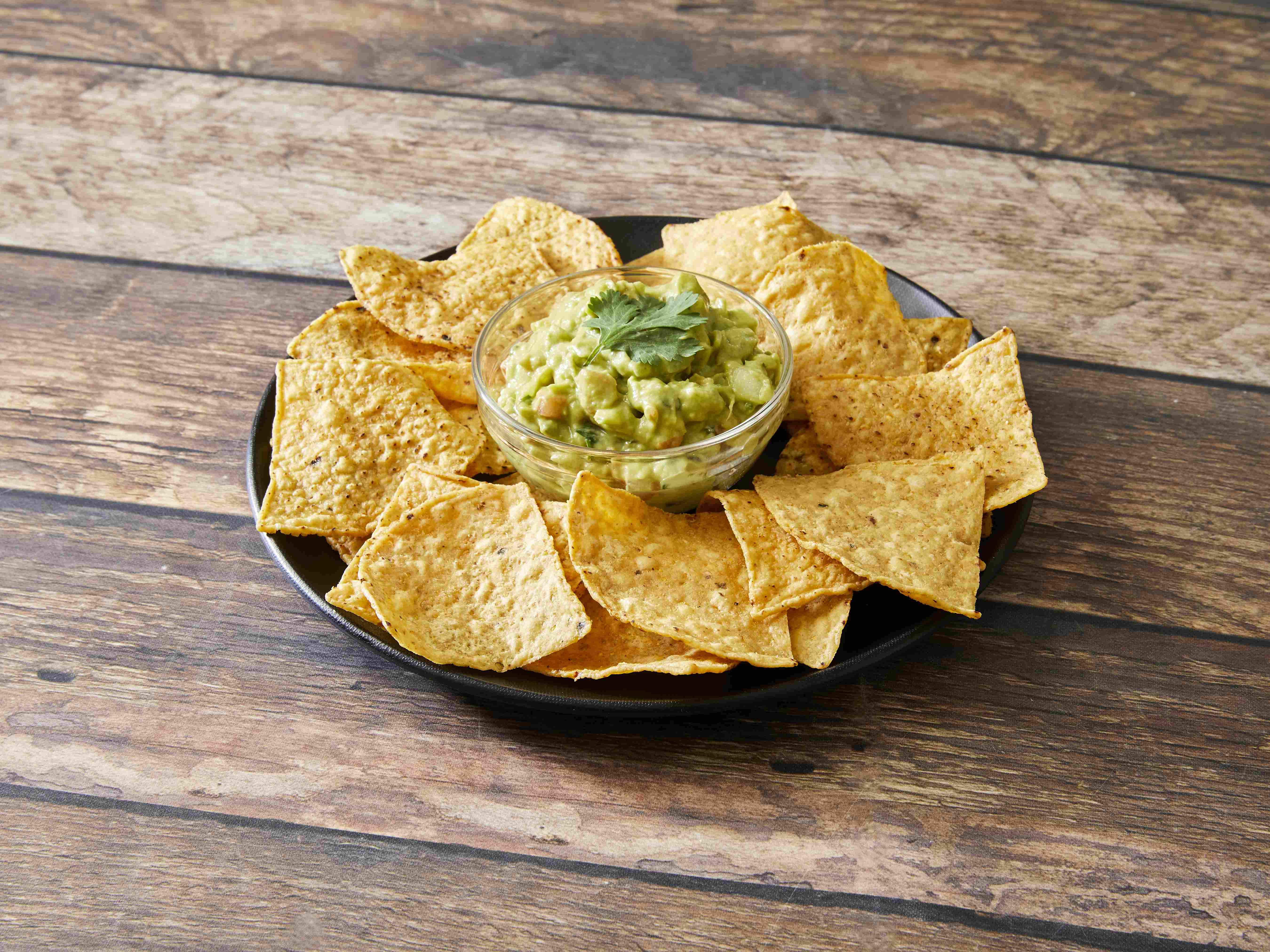 Order Guacamole & Chips - food online from Tacos El Norte store, Lake Bluff on bringmethat.com