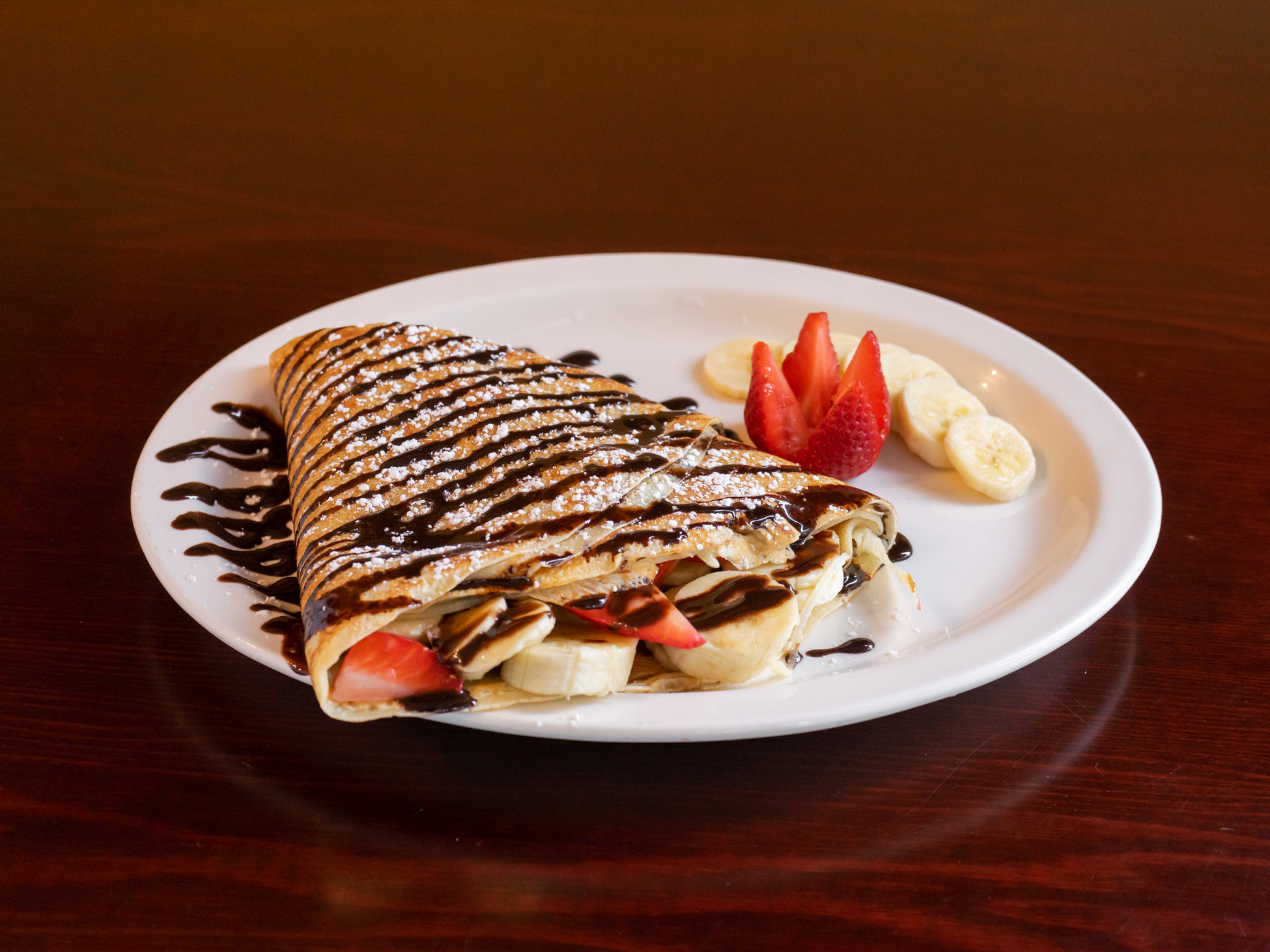 Order Strawberry Nutella Crepe food online from Planet Cafe store, San Francisco on bringmethat.com
