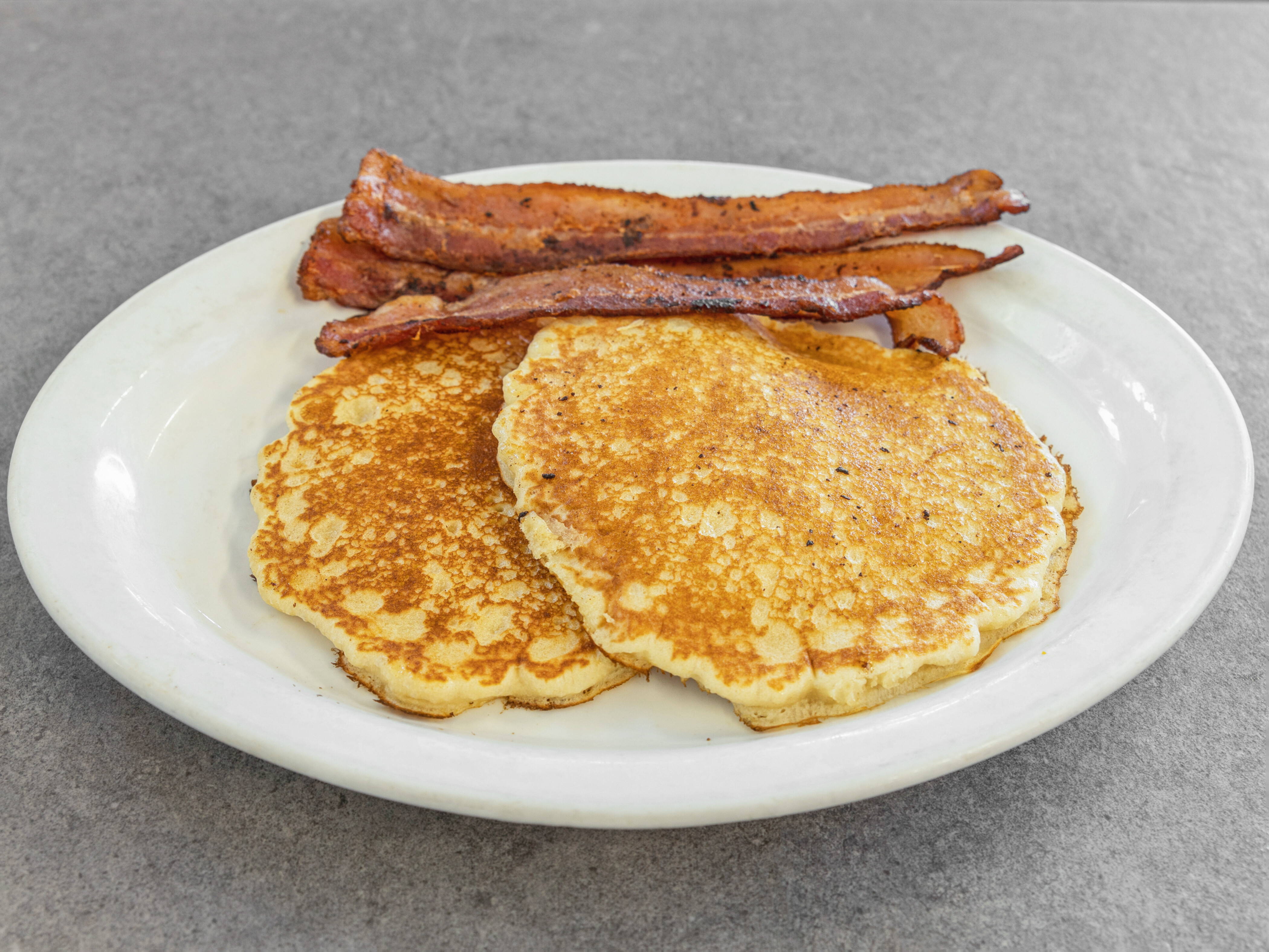 Order Meats with 2 Pancakes Platter food online from Lisa's 5th Street Diner store, Bowling Green on bringmethat.com