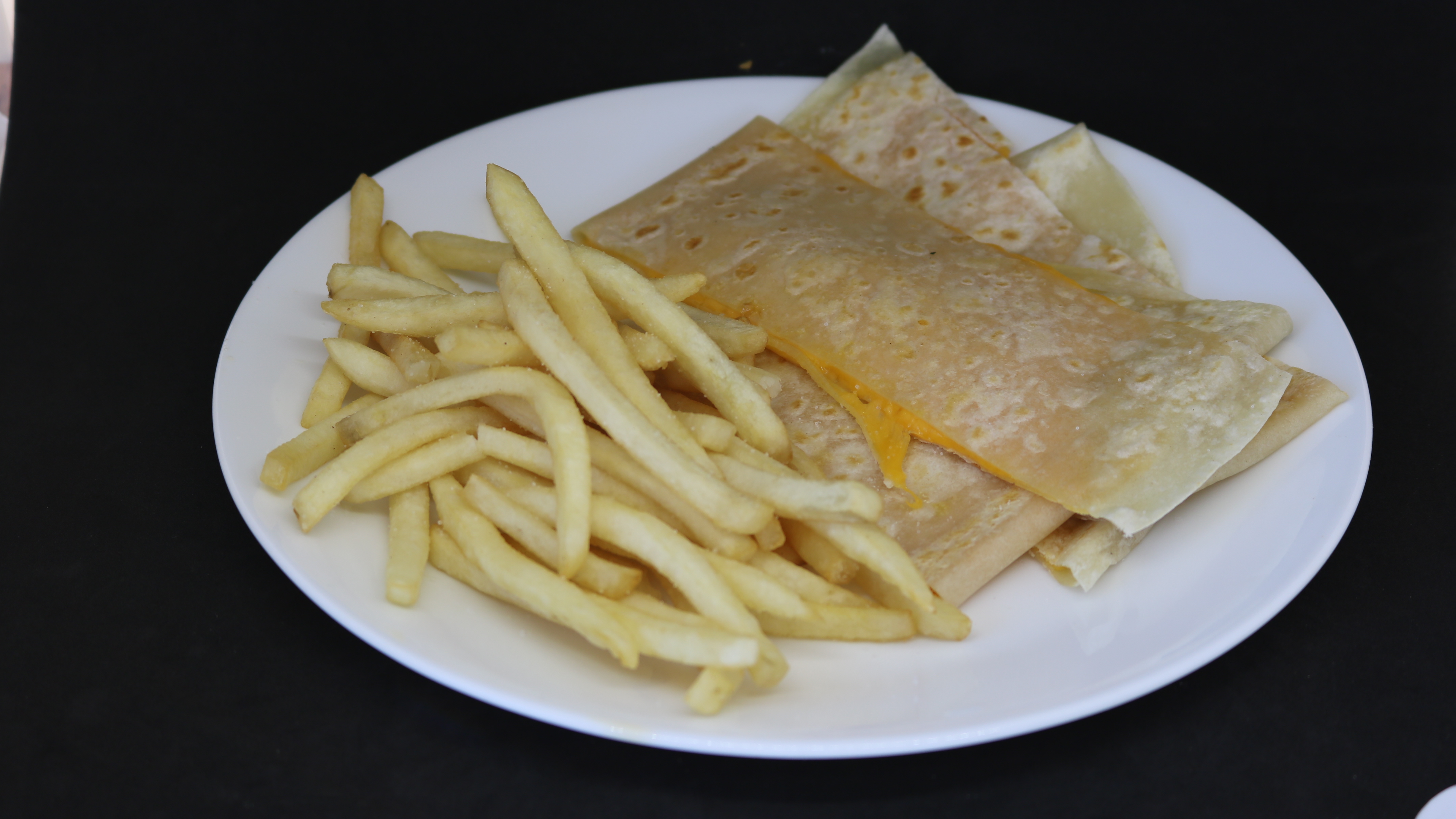 Order Kids Quesadilla and Fries food online from Albertaco's Mexican Food Inc store, Cypress on bringmethat.com